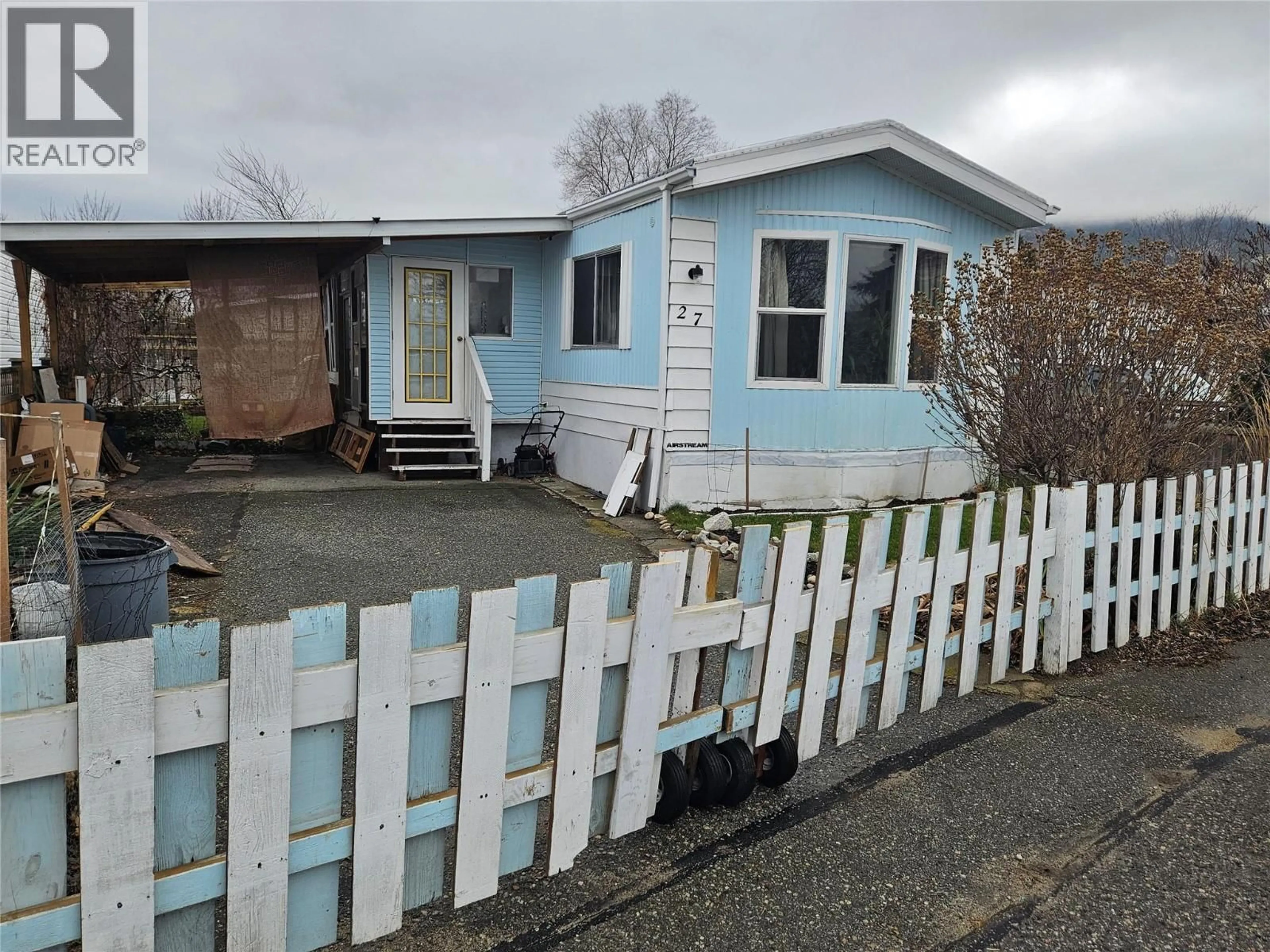 A pic from outside/outdoor area/front of a property/back of a property/a pic from drone, street for 27 - 3999 SKAHA LAKE ROAD, Penticton British Columbia V2A6J7