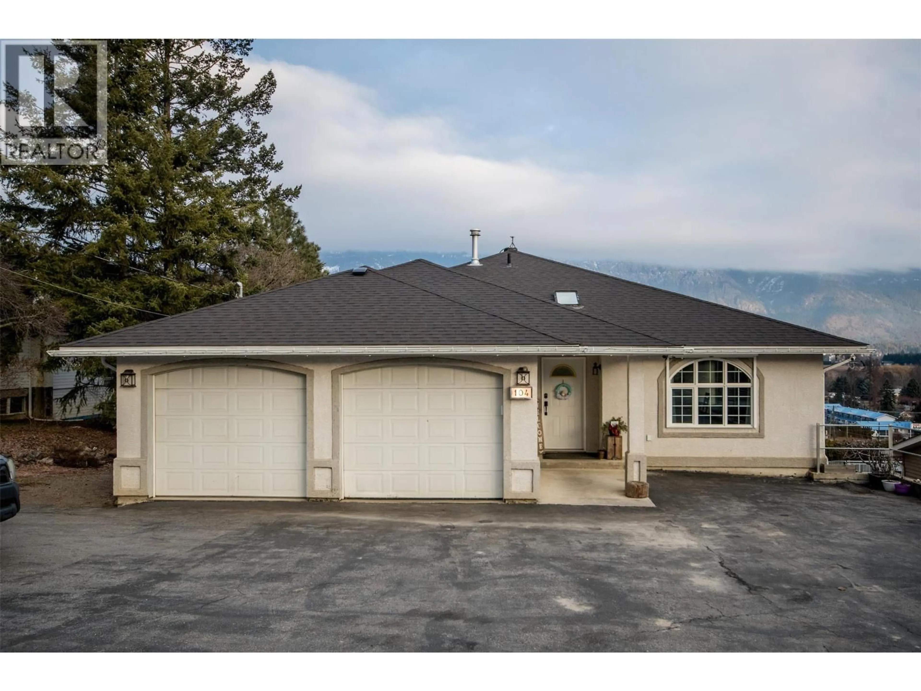 Home with vinyl exterior material, mountain view for 104 26TH AVENUE NORTH, Erickson British Columbia V0B1G1