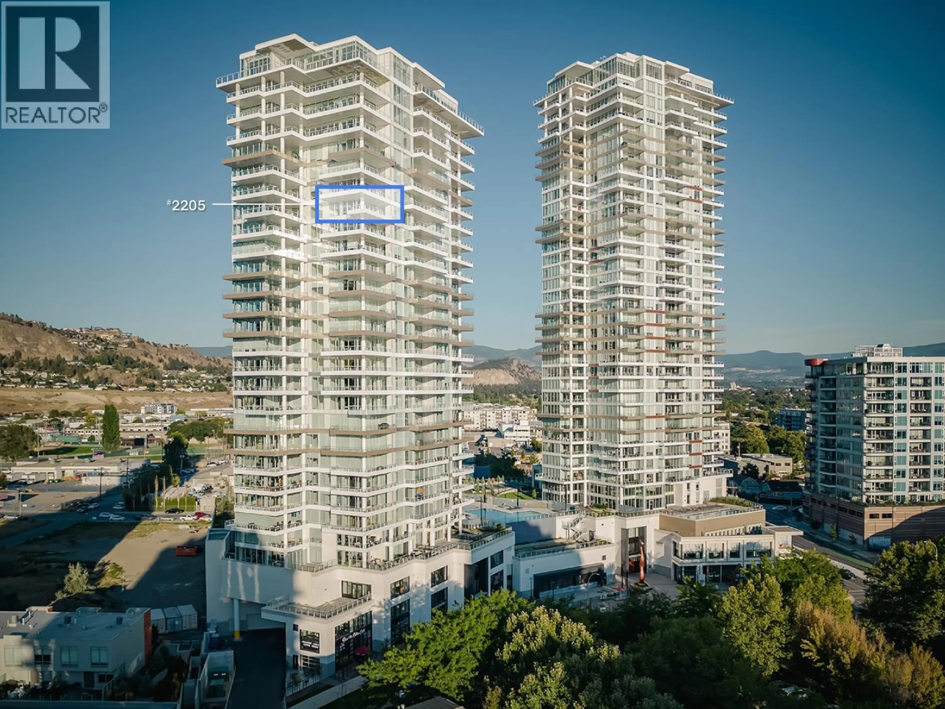 A pic from outside/outdoor area/front of a property/back of a property/a pic from drone, city buildings view from balcony for 2205 - 1181 SUNSET DRIVE, Kelowna British Columbia V1Y0J4