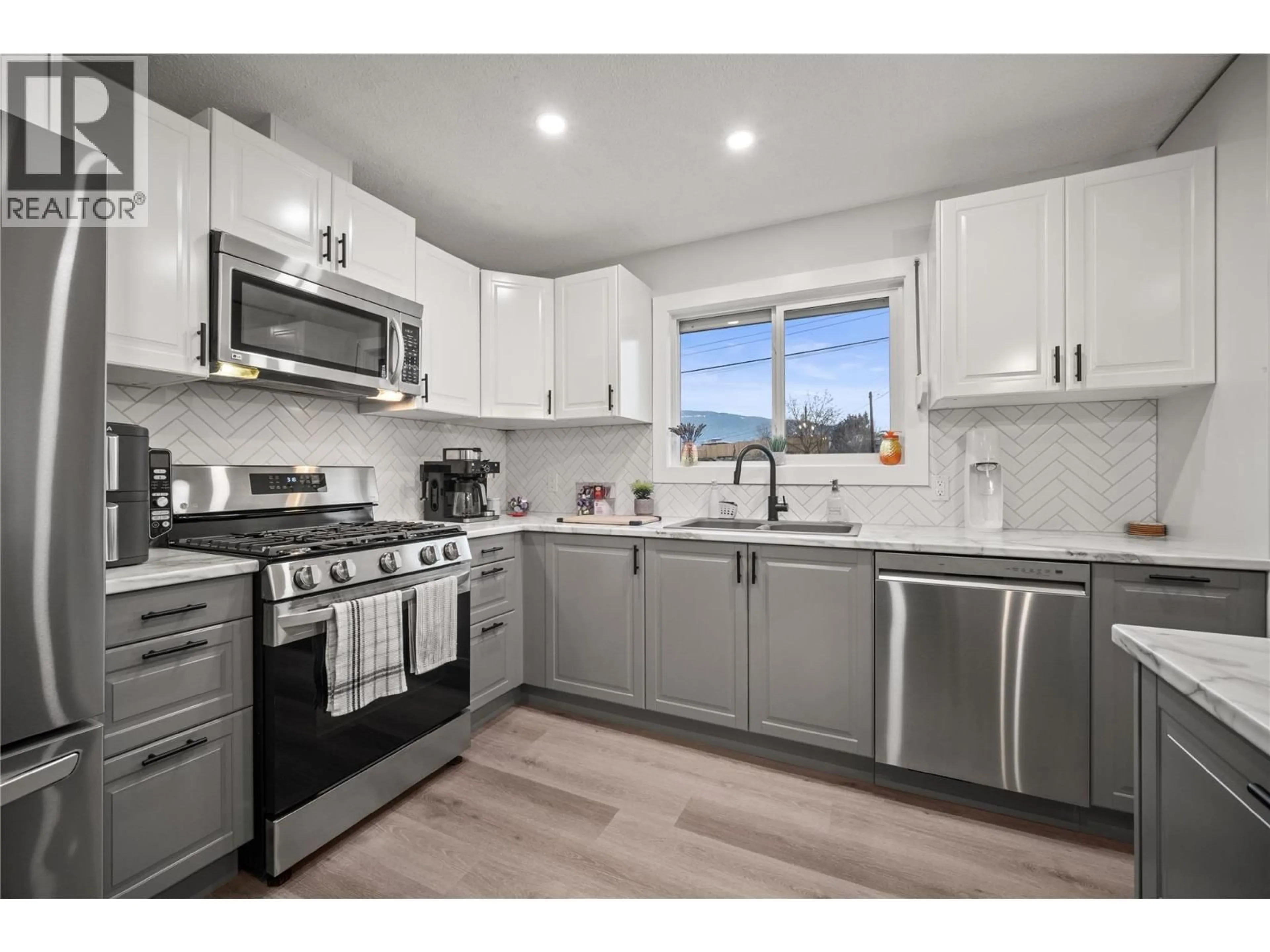 Open concept kitchen, unknown for 4203 ALEXIS PARK DRIVE, Vernon British Columbia V1T7T8
