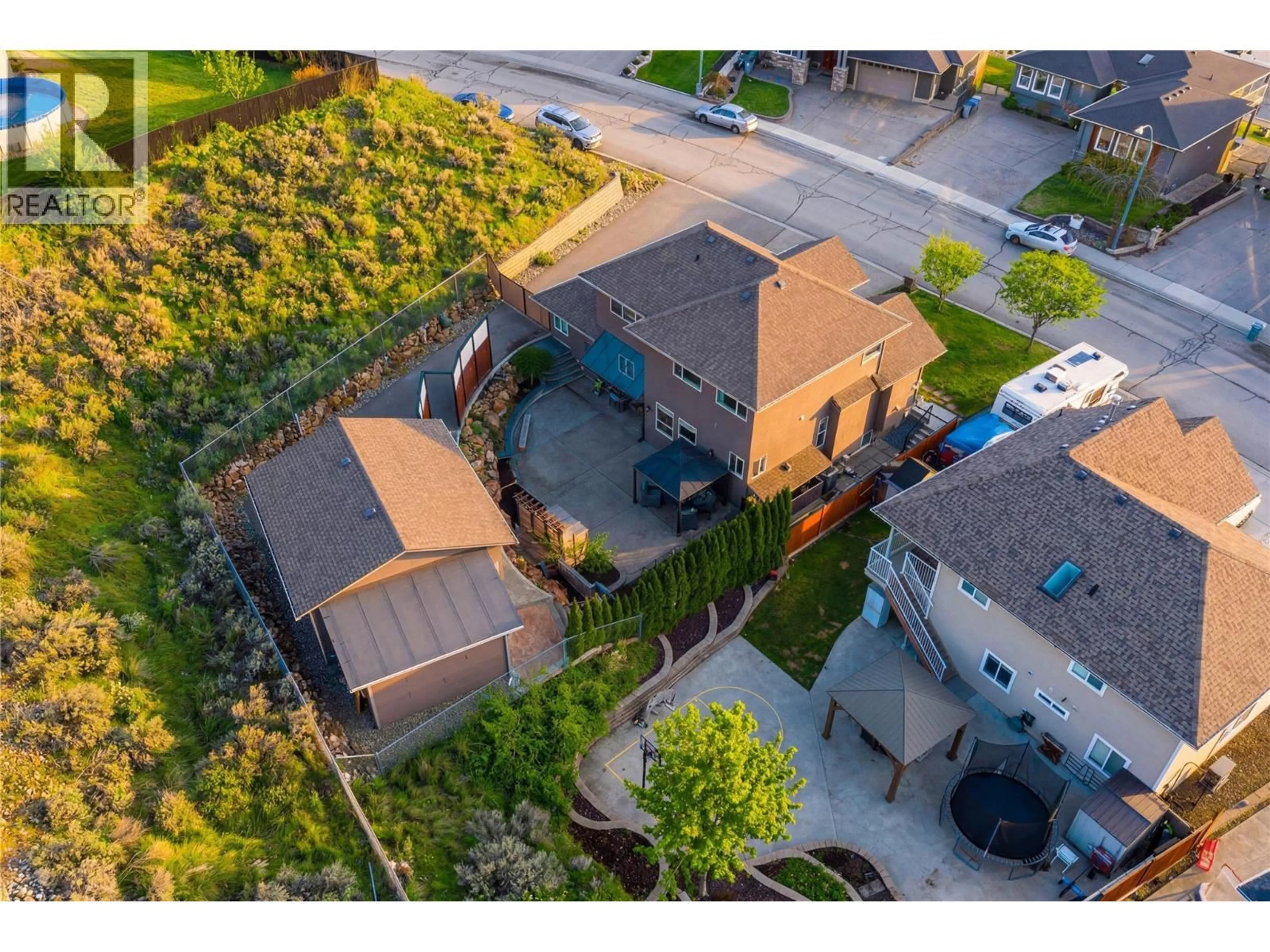 A pic from outside/outdoor area/front of a property/back of a property/a pic from drone, street for 1052 QUAIL DRIVE, Kamloops British Columbia V2B8N9
