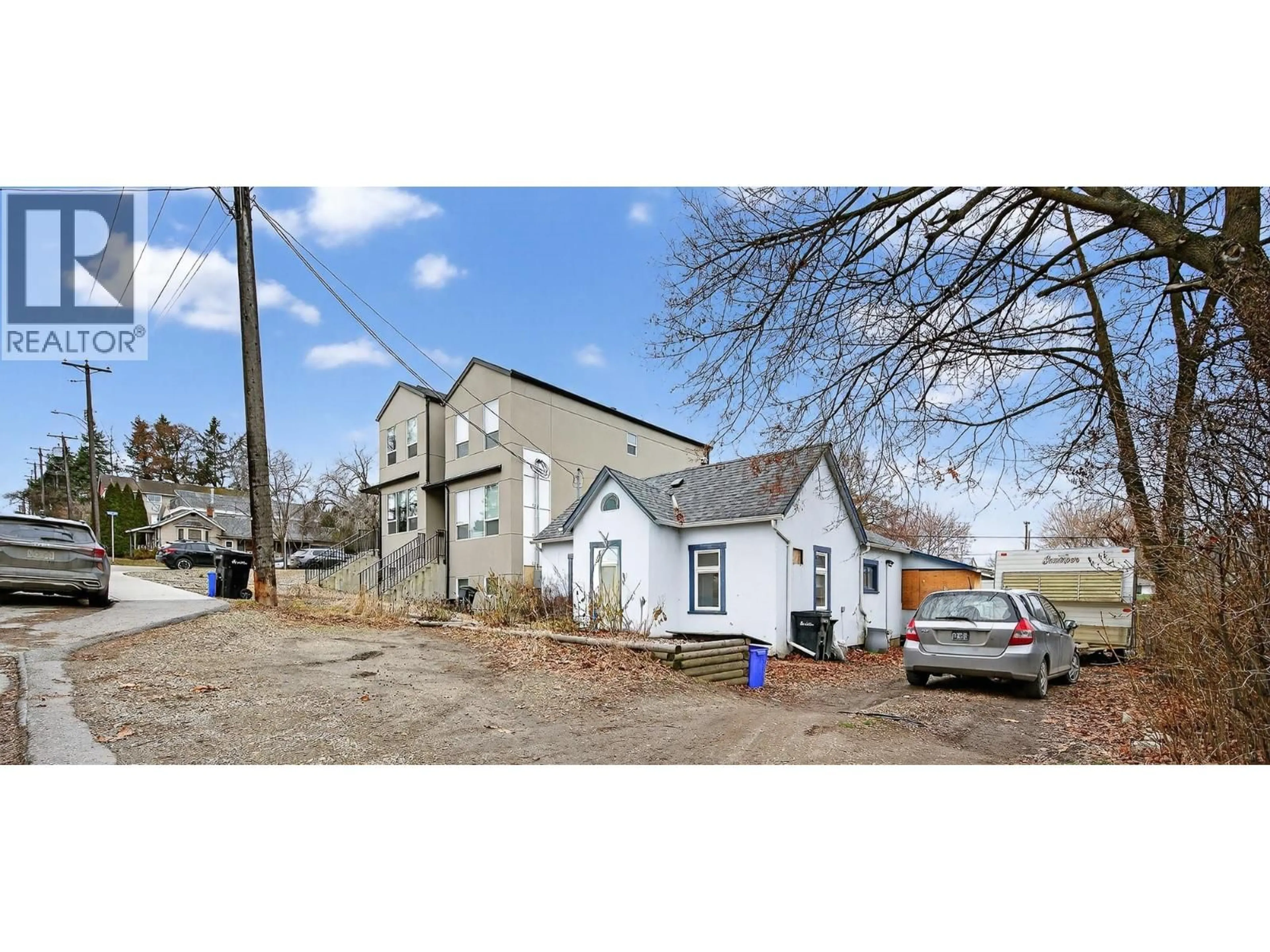 A pic from outside/outdoor area/front of a property/back of a property/a pic from drone, street for 2004 33 STREET, Vernon British Columbia V1T5R6