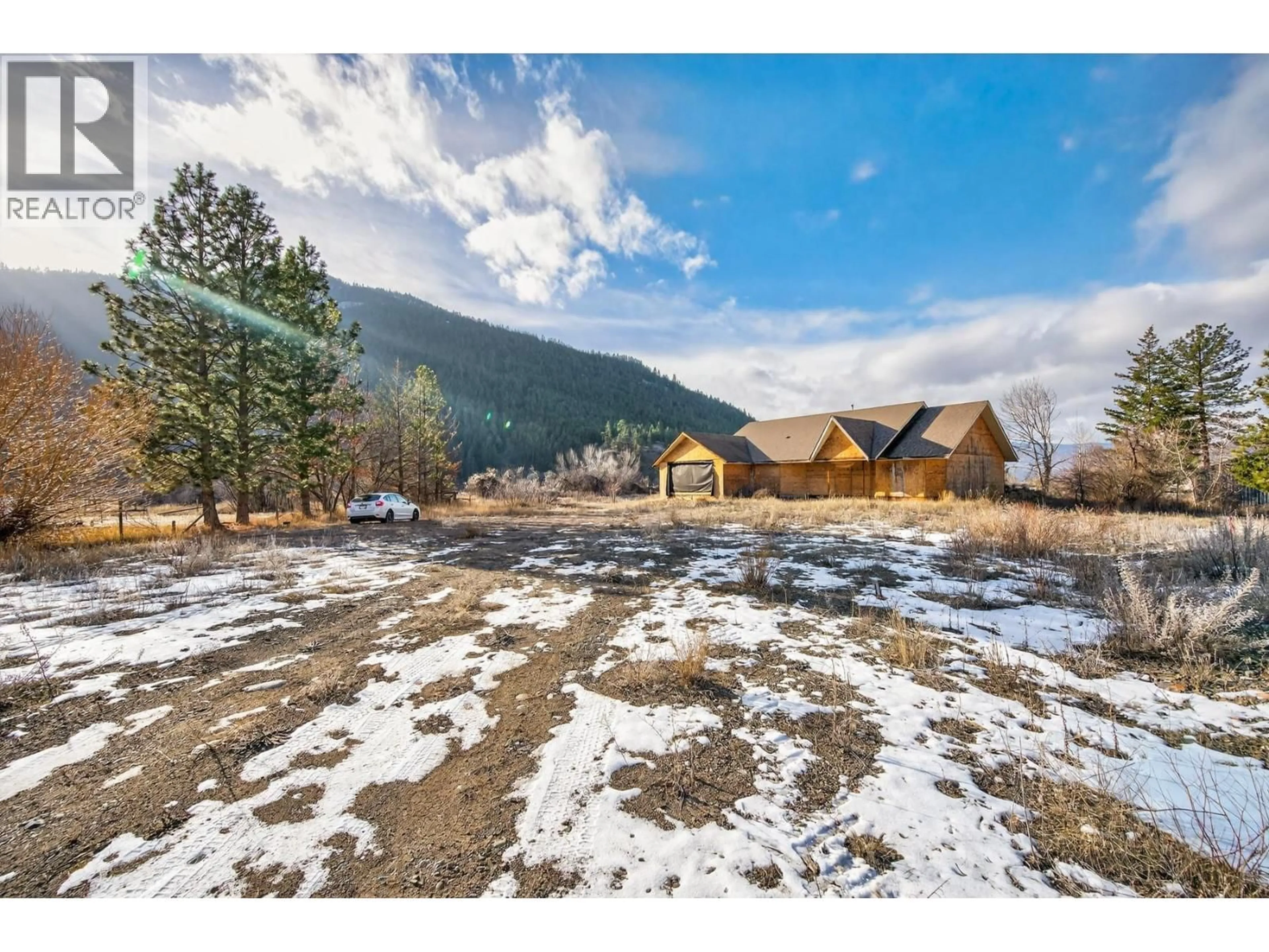 A pic from outside/outdoor area/front of a property/back of a property/a pic from drone, mountain view for 390 MARSHALL ROAD, Merritt British Columbia V1K1N4