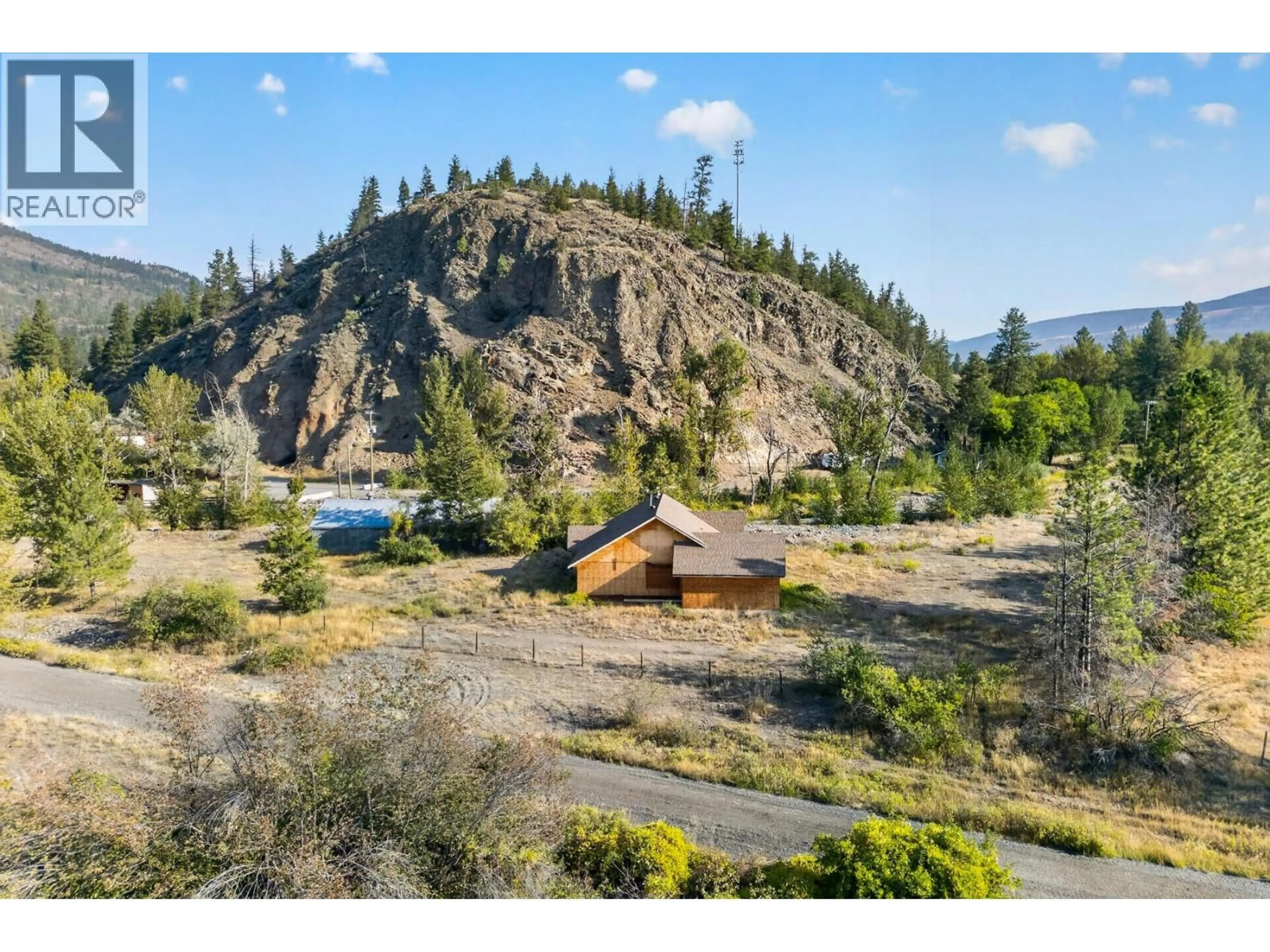 A pic from outside/outdoor area/front of a property/back of a property/a pic from drone, mountain view for 390 MARSHALL ROAD, Merritt British Columbia V1K1N4