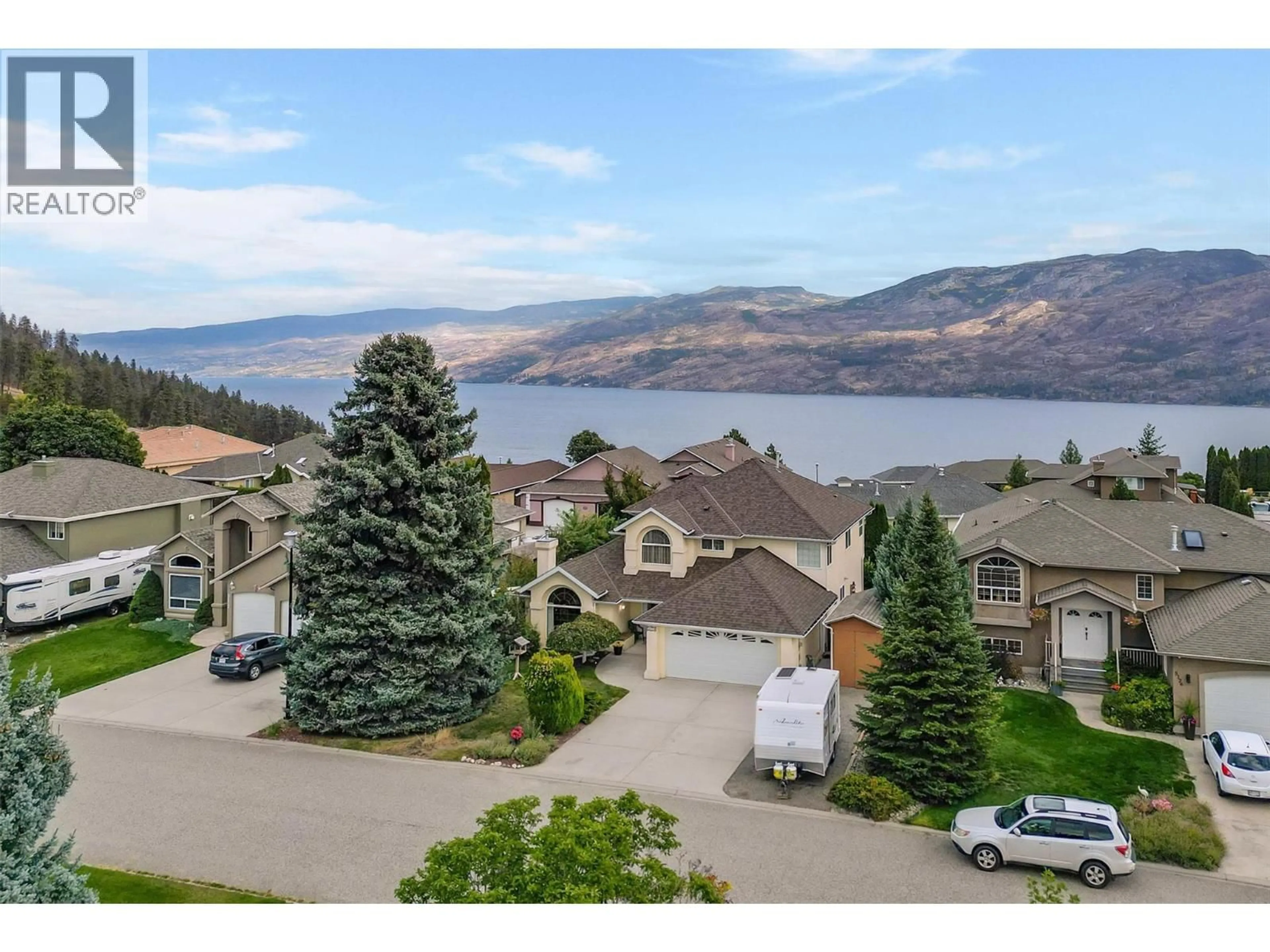 A pic from outside/outdoor area/front of a property/back of a property/a pic from drone, water/lake/river/ocean view for 5174 MORRISON CRESCENT, Peachland British Columbia V0H1X2