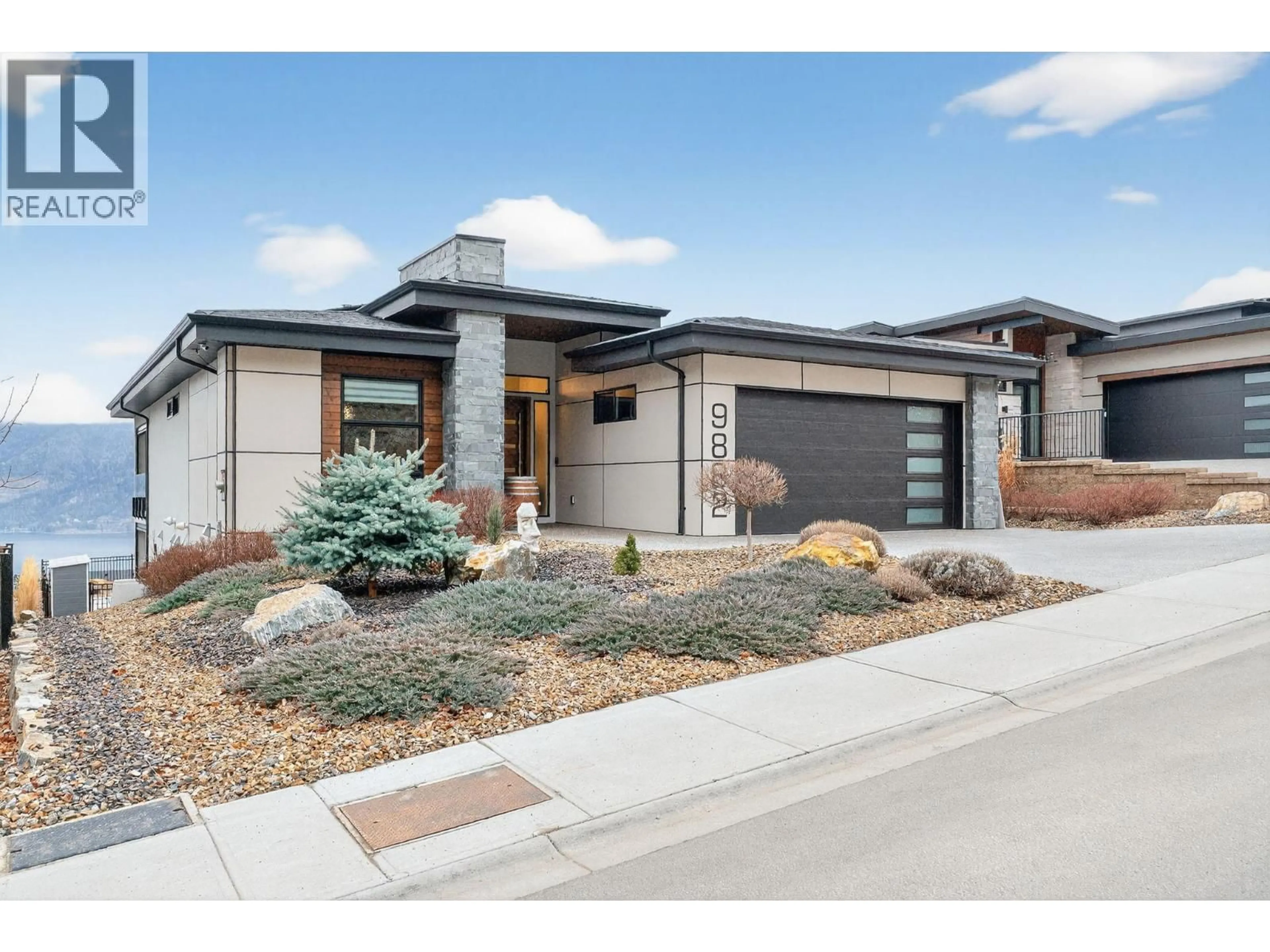 Home with brick exterior material, street for 9882 BEACON HILL DRIVE, Lake Country British Columbia V4V0A9