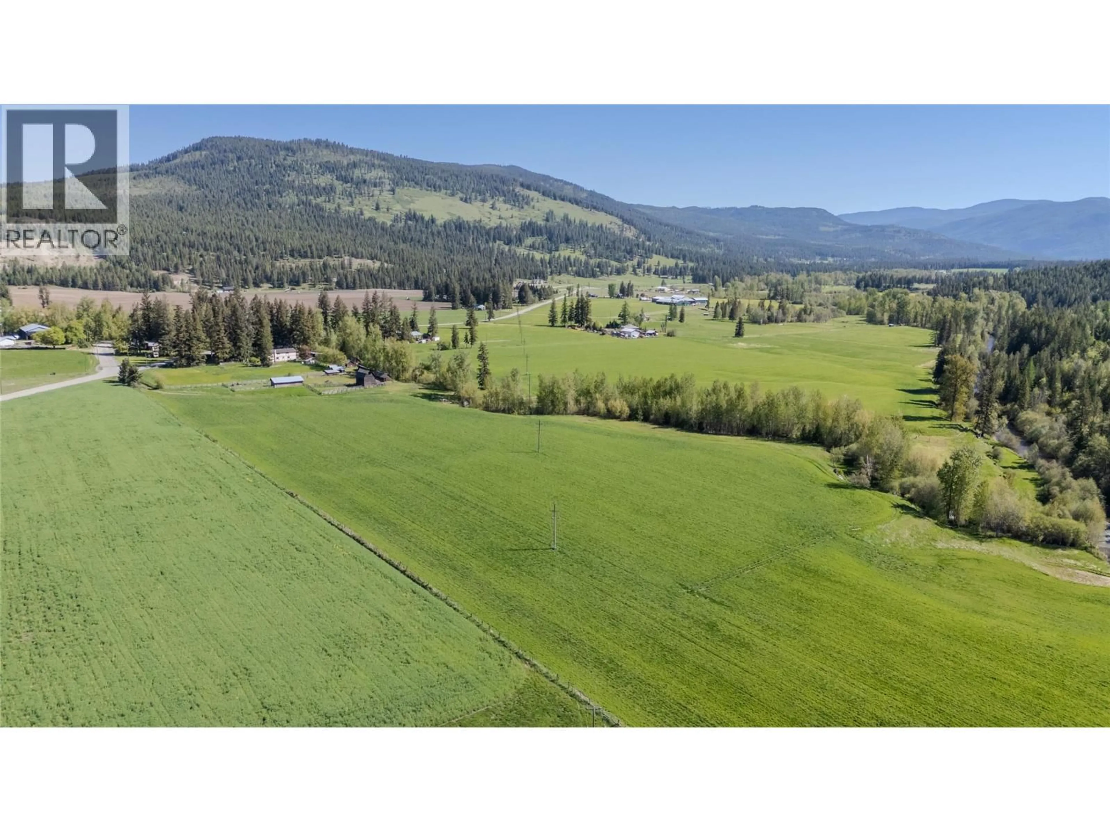 A pic from outside/outdoor area/front of a property/back of a property/a pic from drone, mountain view for 487 MABEL LAKE ROAD, Lumby British Columbia V0E2G5