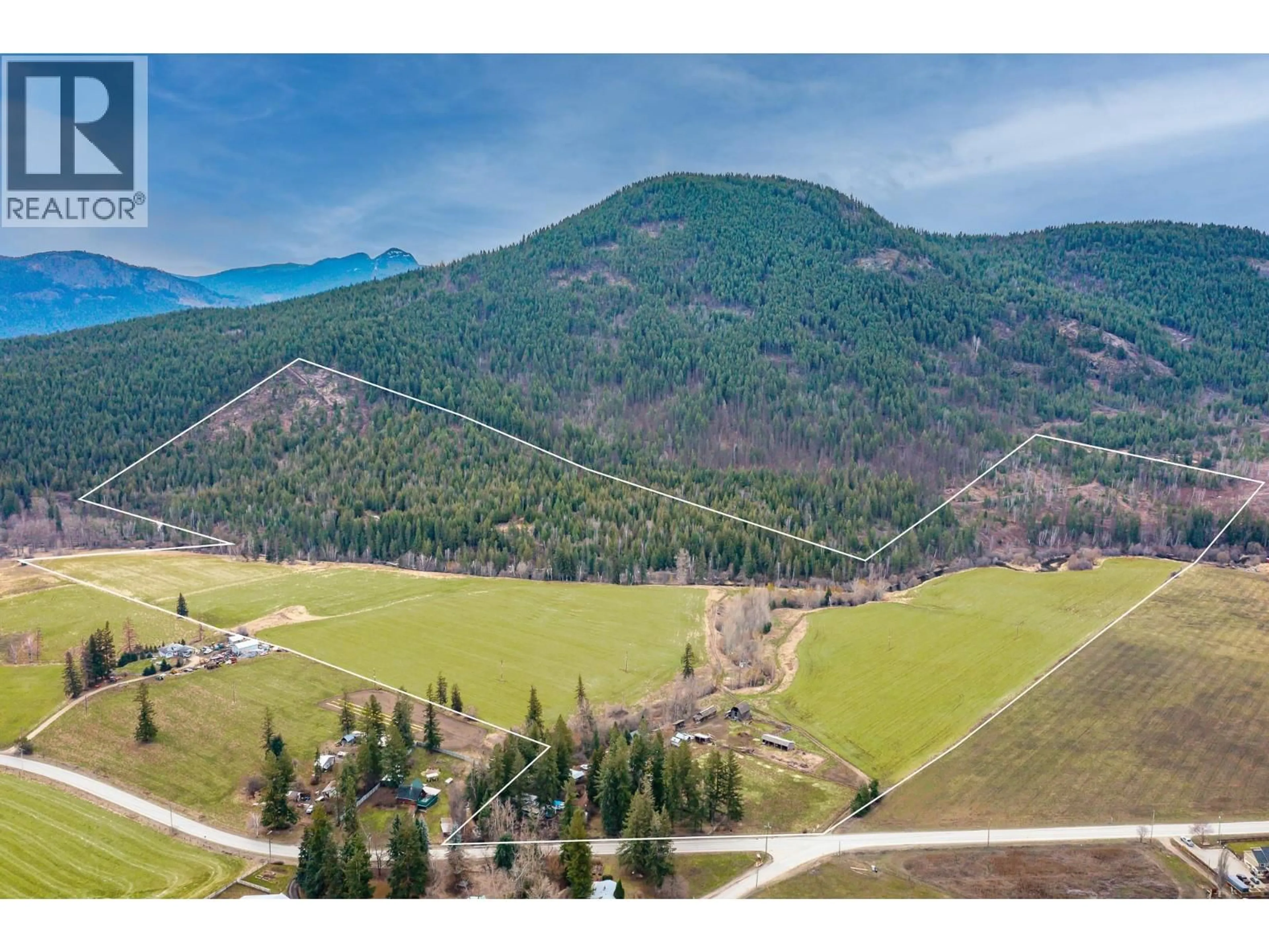 A pic from outside/outdoor area/front of a property/back of a property/a pic from drone, mountain view for 487 MABEL LAKE ROAD, Lumby British Columbia V0E2G5