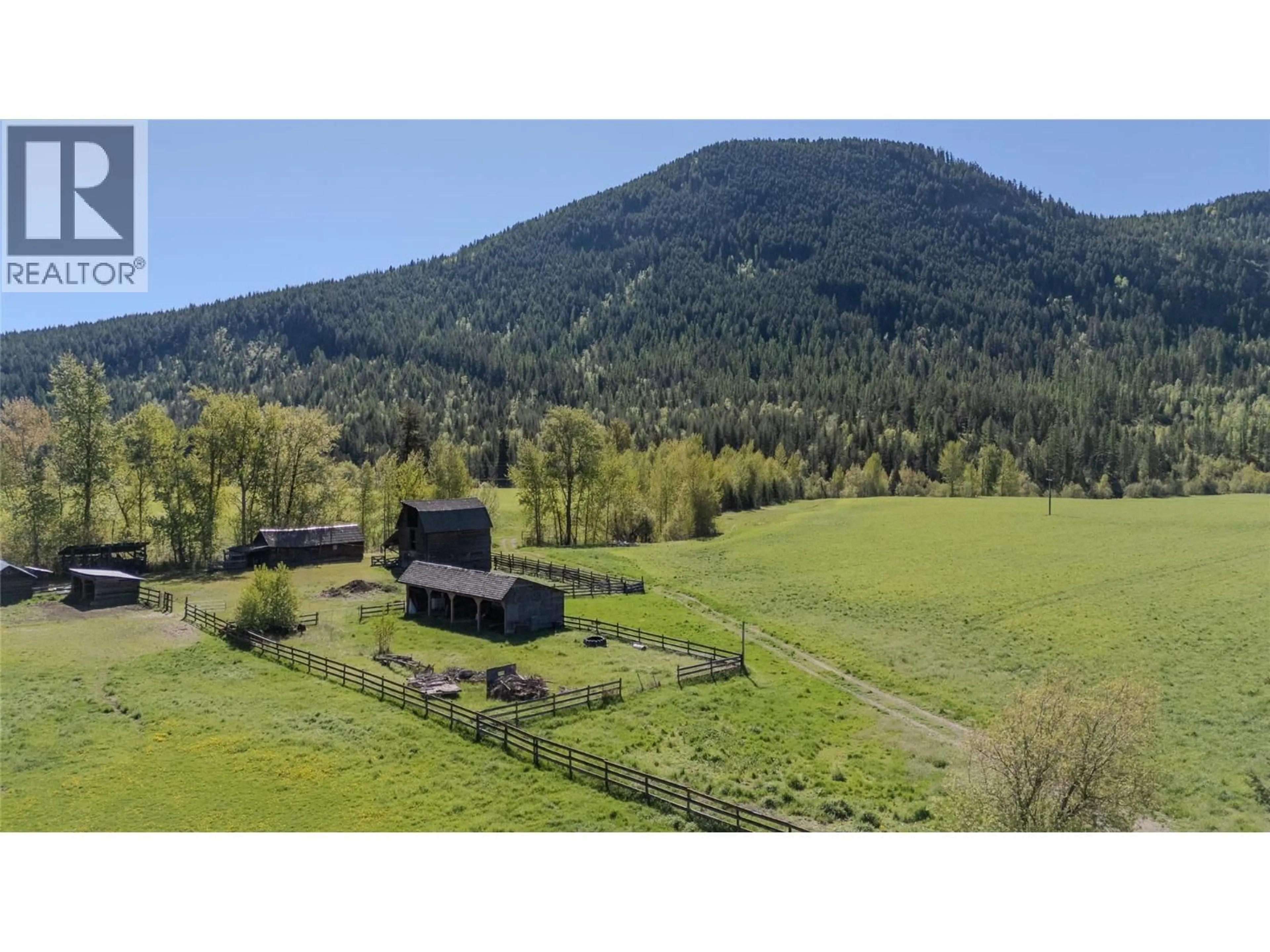 A pic from outside/outdoor area/front of a property/back of a property/a pic from drone, mountain view for 487 MABEL LAKE ROAD, Lumby British Columbia V0E2G5