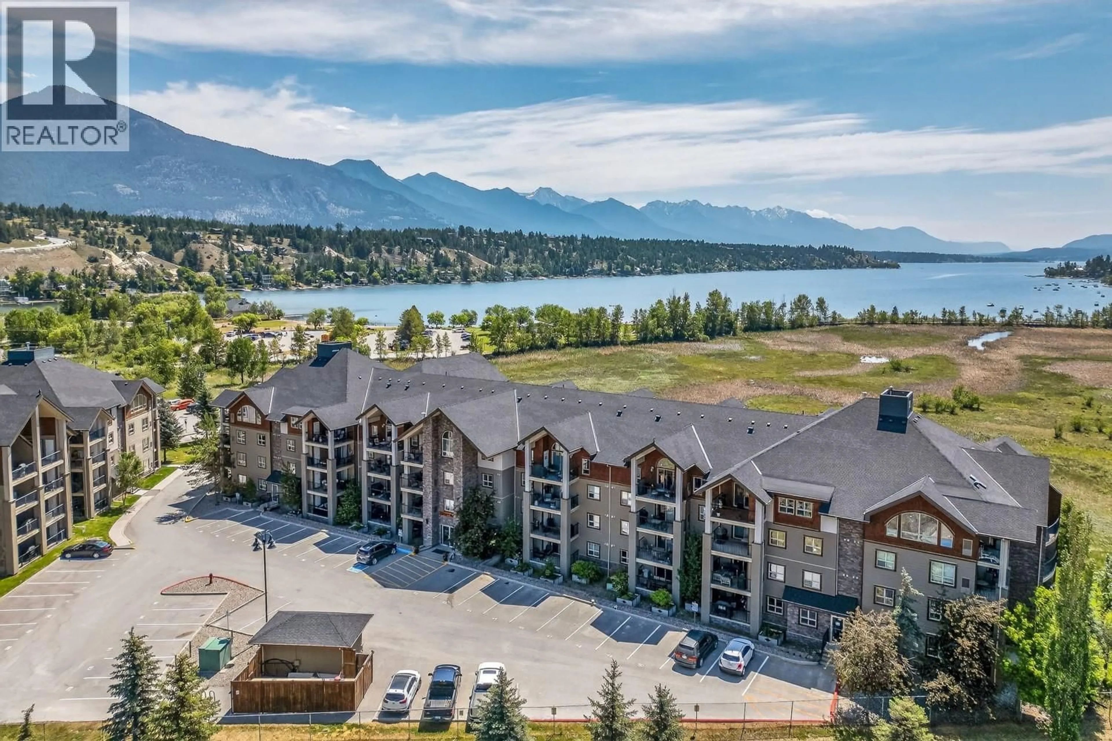 A pic from outside/outdoor area/front of a property/back of a property/a pic from drone, water/lake/river/ocean view for 1212 - 205 THIRD AVENUE, Invermere British Columbia V0A1K7