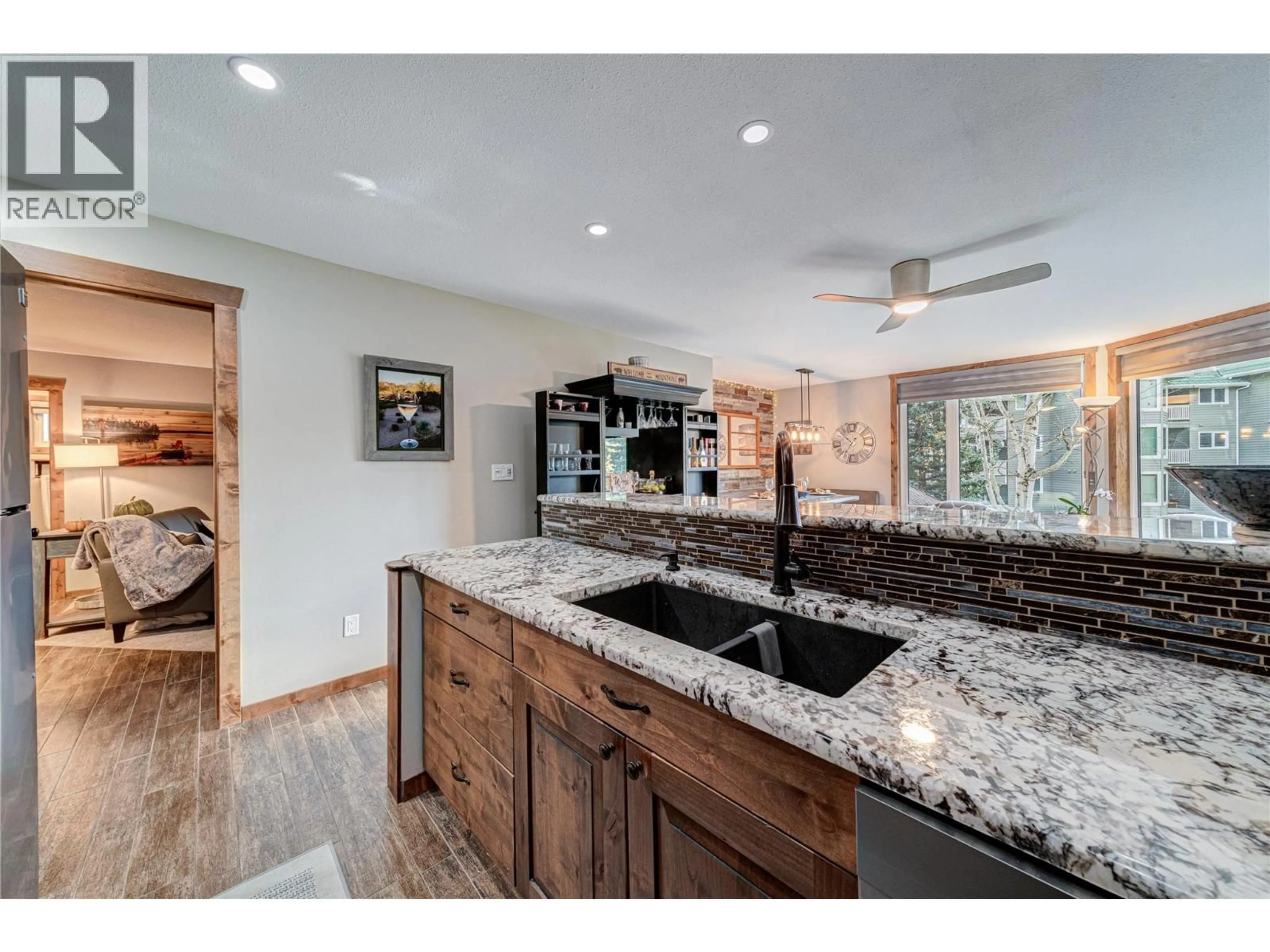 Open concept kitchen, ceramic/tile floor for 221 - 4559 TIMBERLINE CRESCENT, Fernie British Columbia V0B1M6