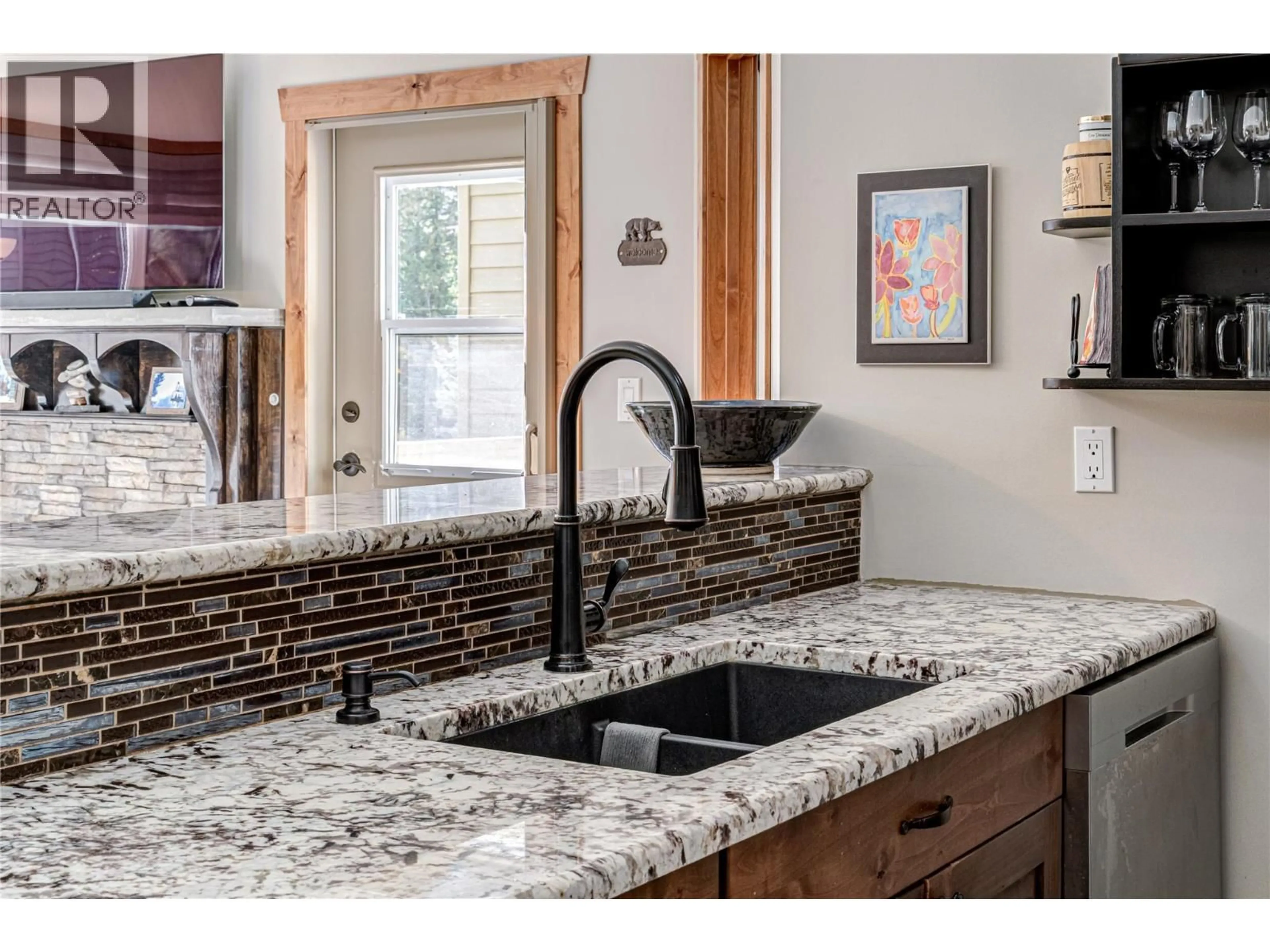 Open concept kitchen, ceramic/tile floor for 221 - 4559 TIMBERLINE CRESCENT, Fernie British Columbia V0B1M6