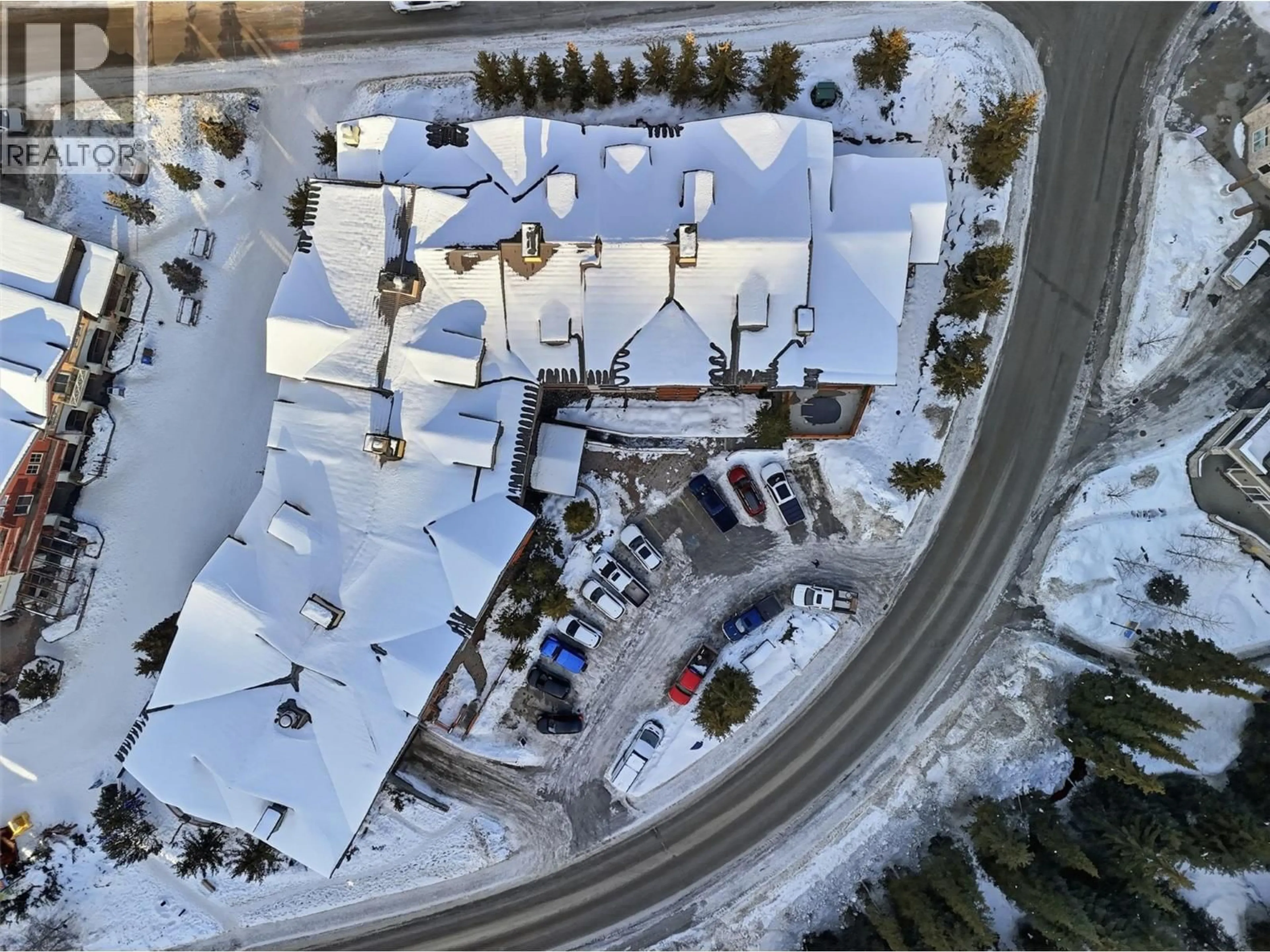 A pic from outside/outdoor area/front of a property/back of a property/a pic from drone, street for 102 - 3190 CREEKSIDE WAY, Sun Peaks British Columbia V0E5N0