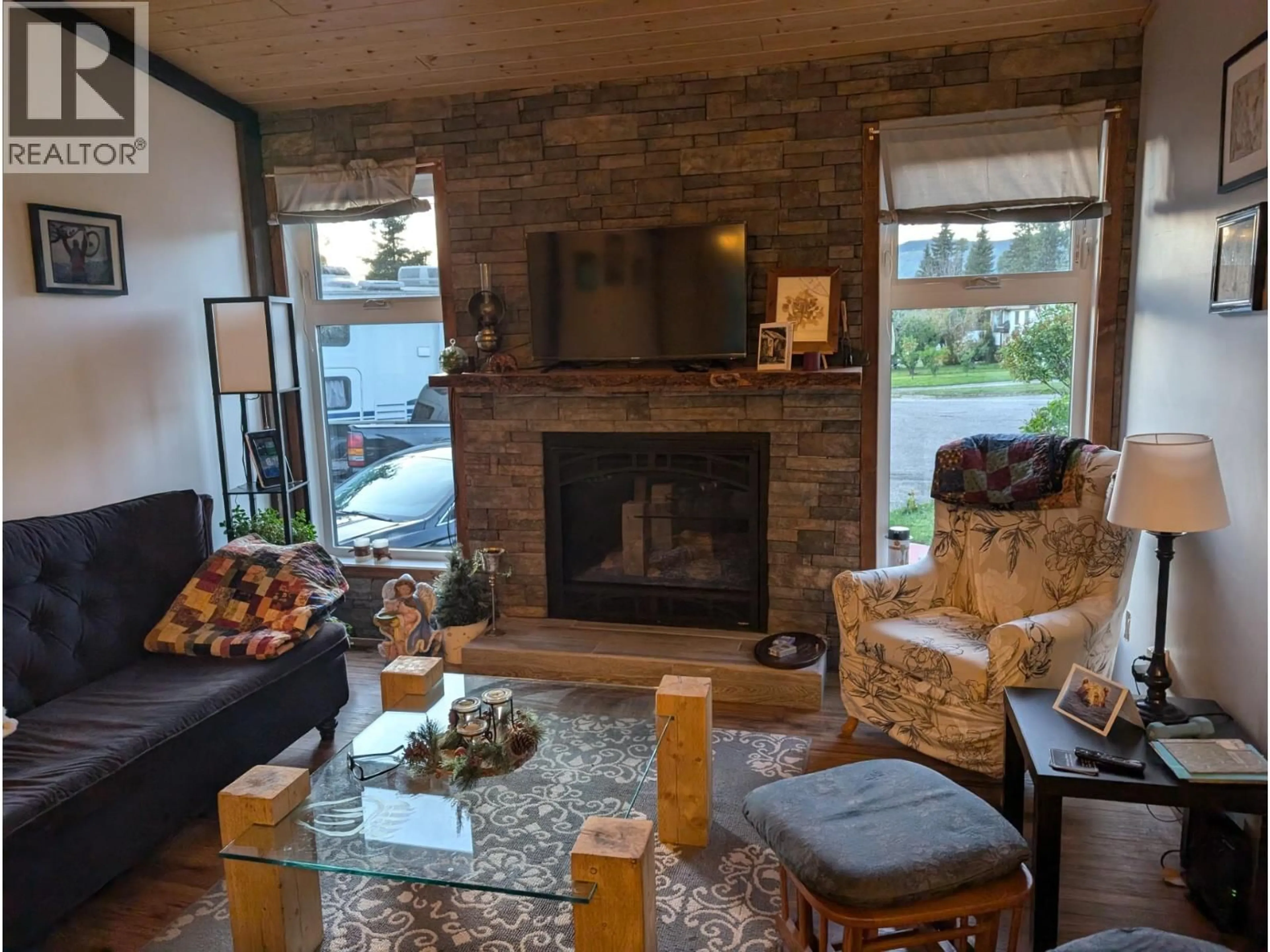 Living room with furniture, unknown for 56 SUKUNKA PLACE, Tumbler Ridge British Columbia V0C2W0