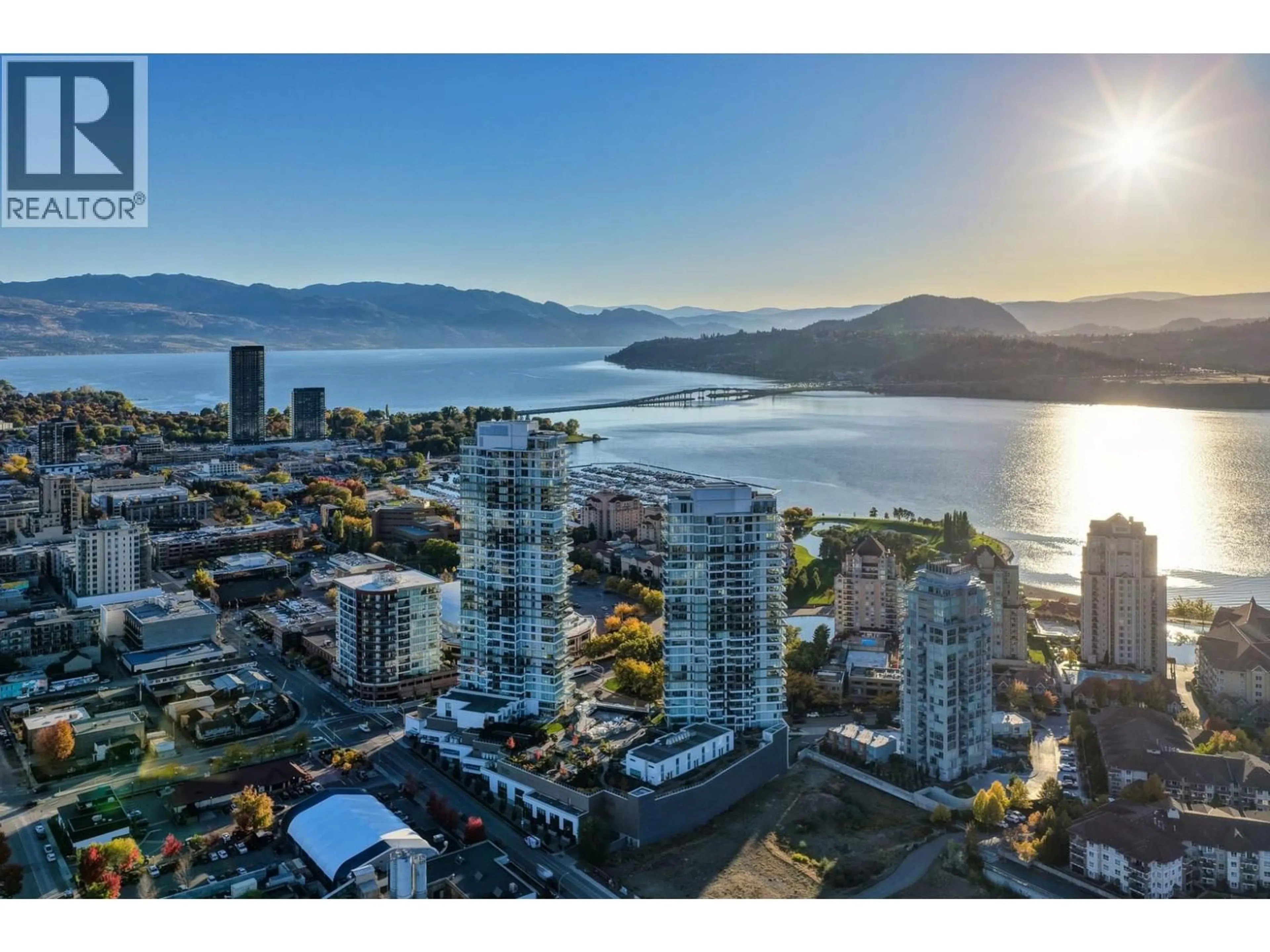 A pic from outside/outdoor area/front of a property/back of a property/a pic from drone, water/lake/river/ocean view for 2601 - 1181 SUNSET DRIVE, Kelowna British Columbia V1Y0J4