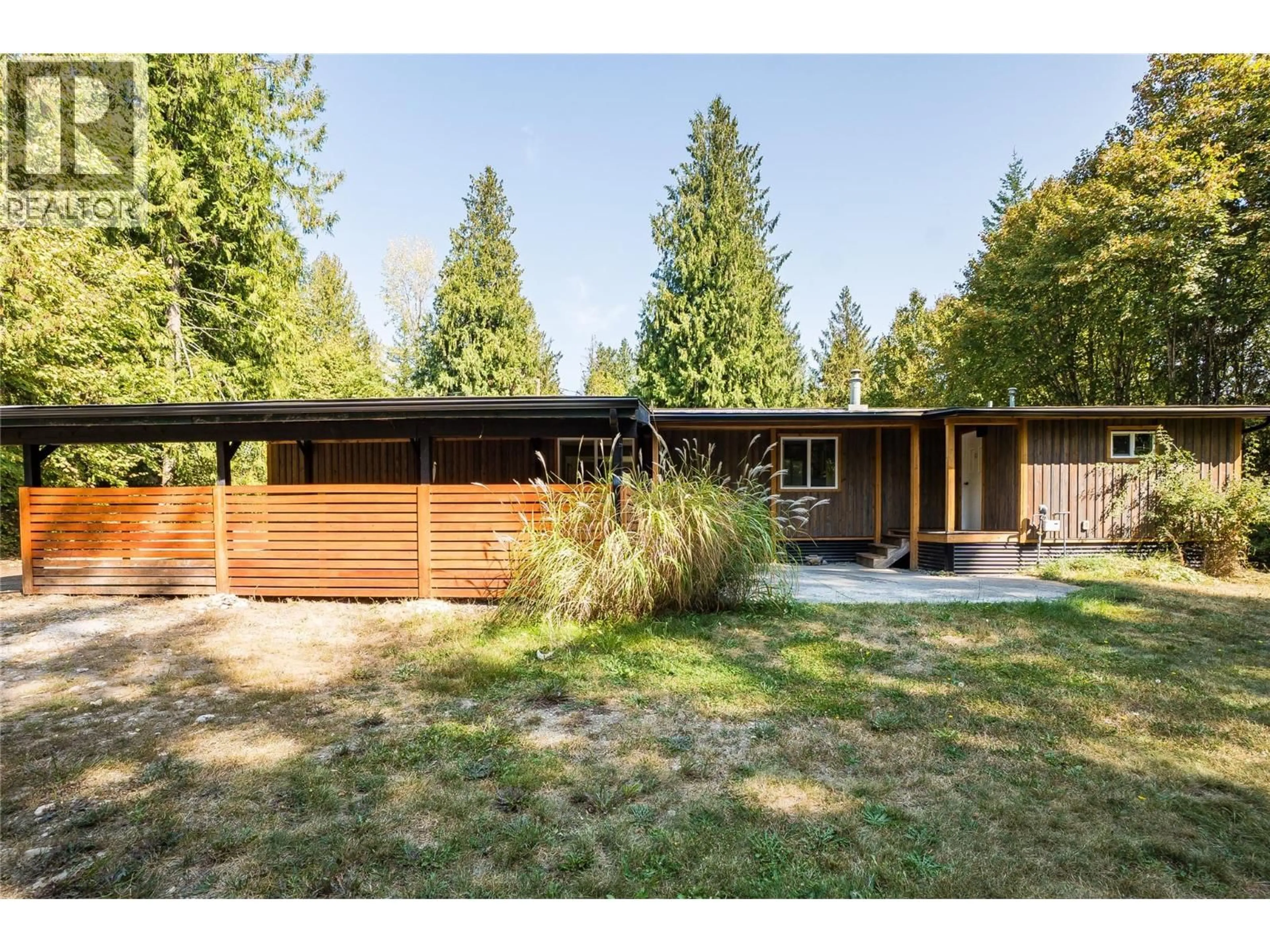 Home with vinyl exterior material, street for 2806 3A HIGHWAY, Nelson British Columbia V1L6L9