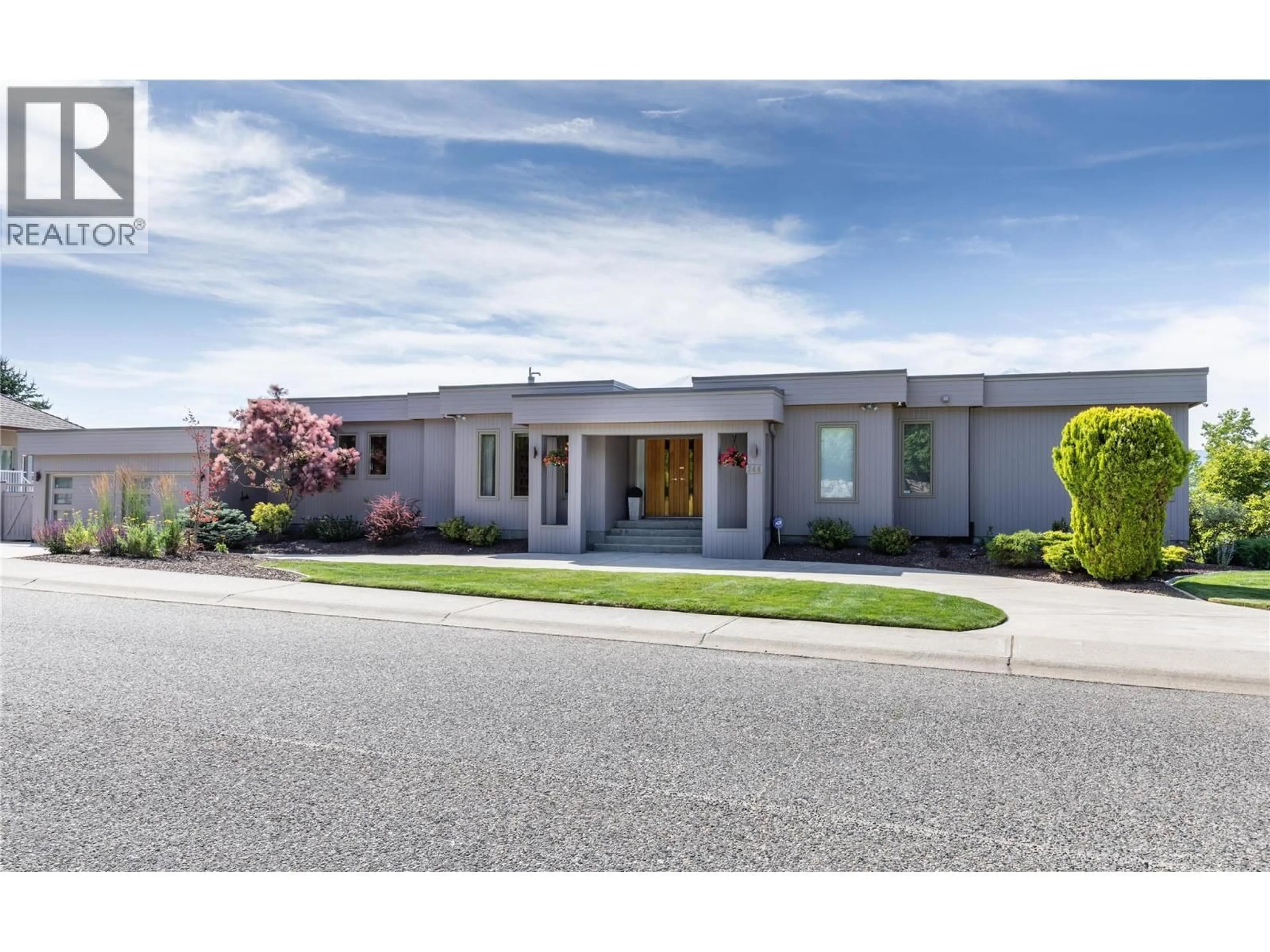 Home with brick exterior material, street for 344 RAVEN DRIVE, Kelowna British Columbia V1W3Y9