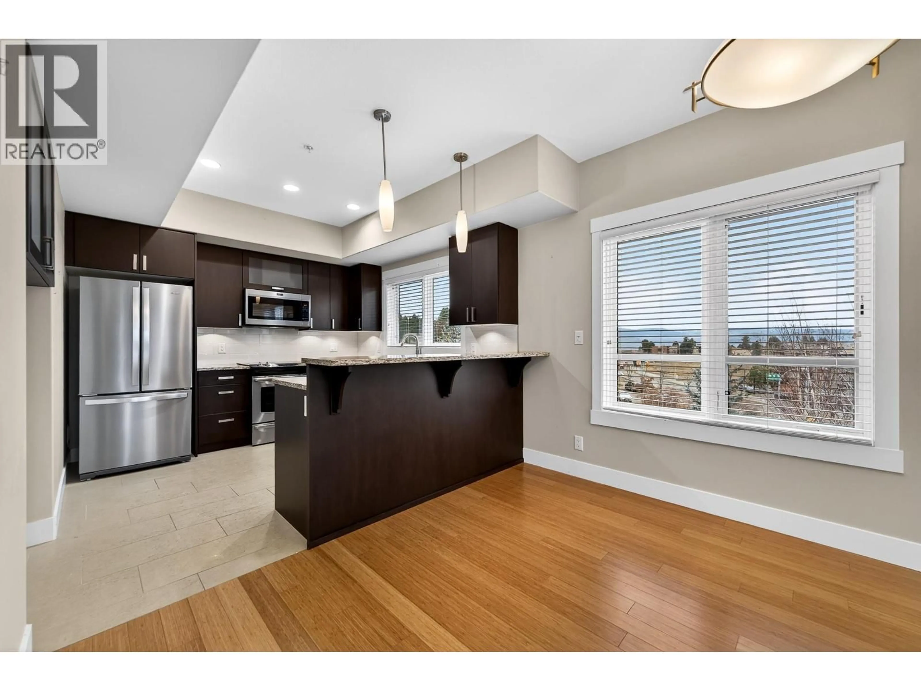 Open concept kitchen, wood/laminate floor for 1201 - 1405 SPRINGHILL DRIVE, Kamloops British Columbia V2C0B4