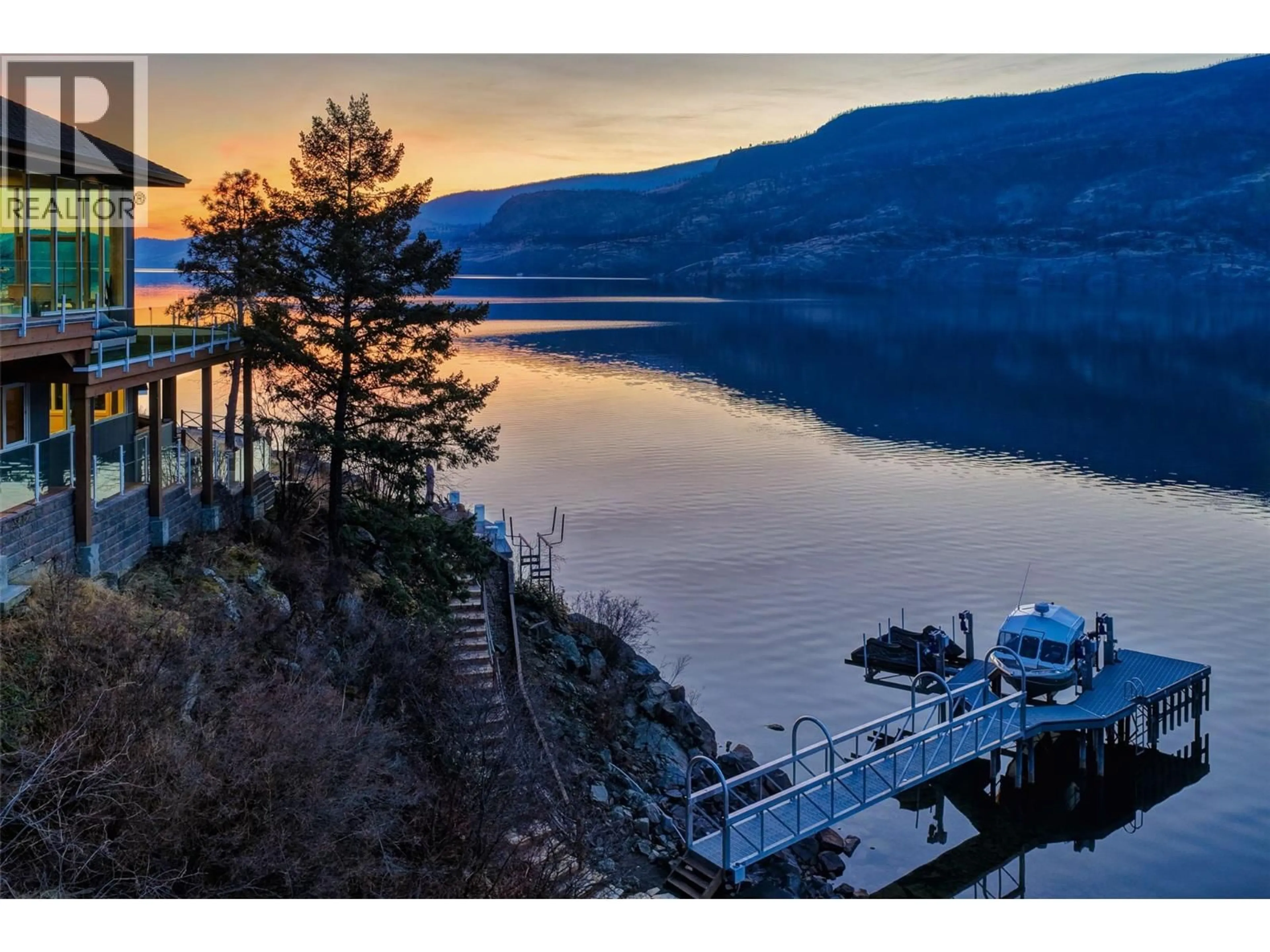 A pic from outside/outdoor area/front of a property/back of a property/a pic from drone, water/lake/river/ocean view for 2100 DEWDNEY ROAD, Kelowna British Columbia V1V2C3