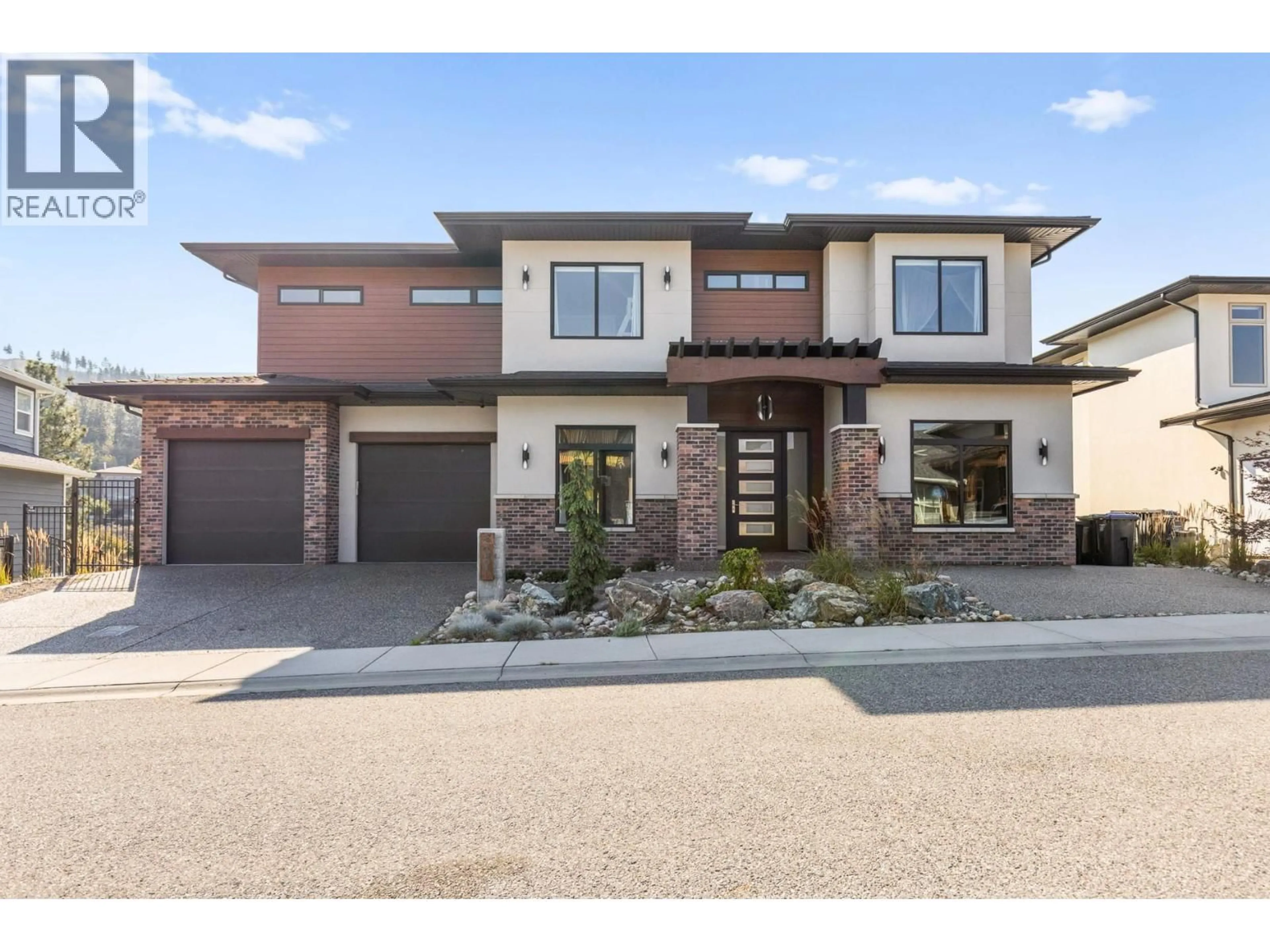 Home with brick exterior material, street for 465 SWAN DRIVE, Kelowna British Columbia V1W5L9