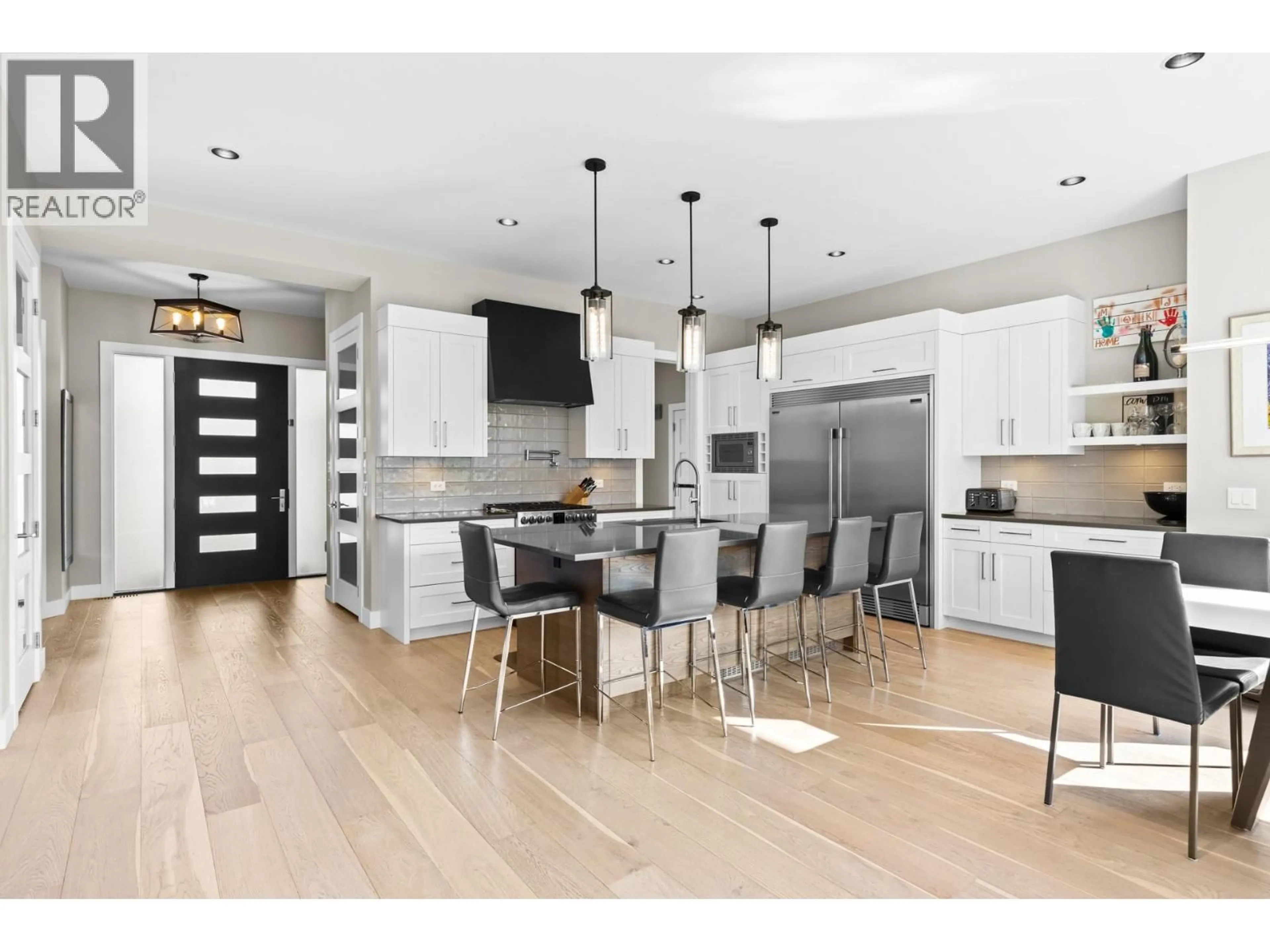 Contemporary kitchen, wood/laminate floor for 465 SWAN DRIVE, Kelowna British Columbia V1W5L9