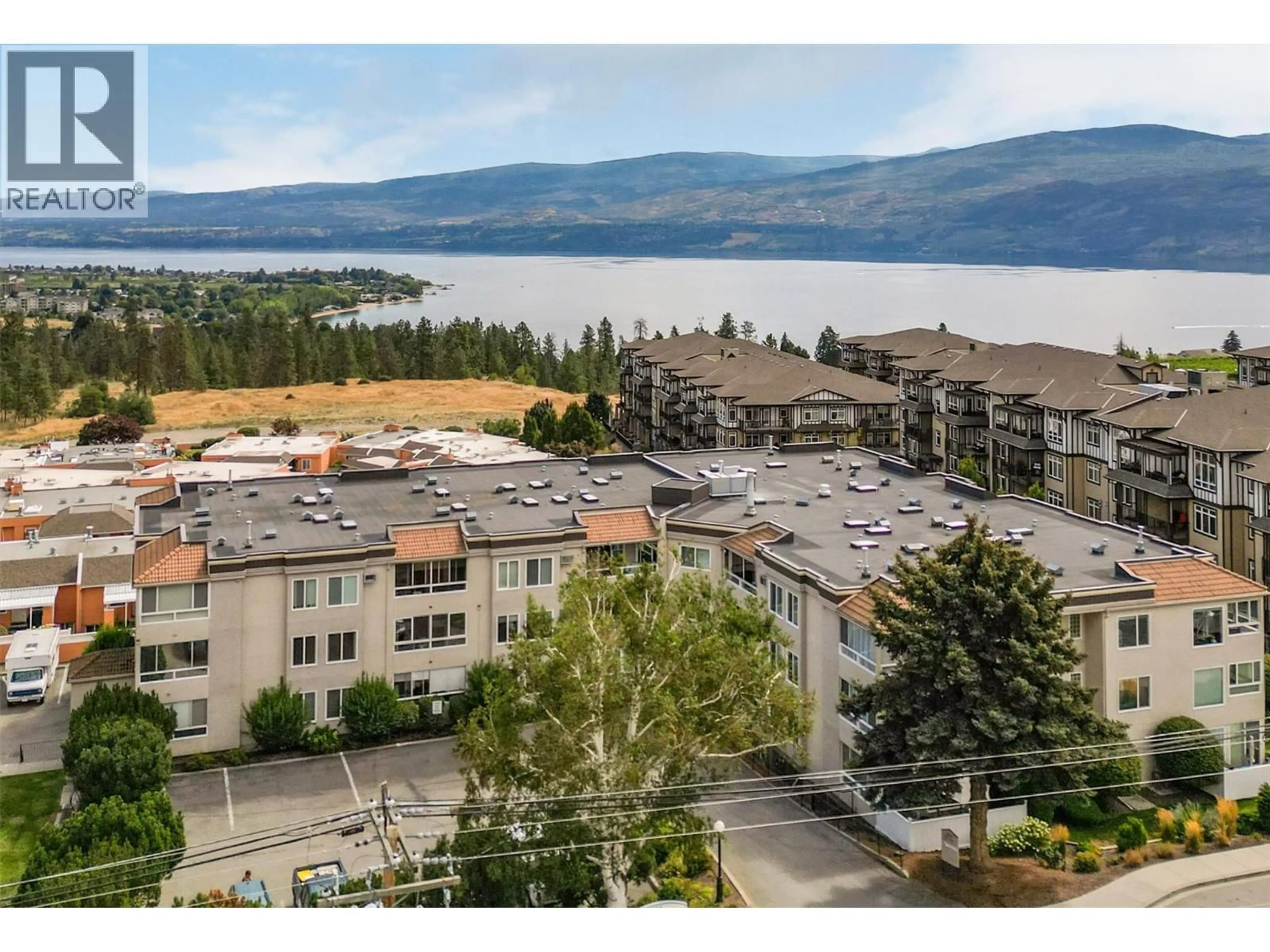 A pic from outside/outdoor area/front of a property/back of a property/a pic from drone, water/lake/river/ocean view for 307 - 3815 BROWN ROAD, West Kelowna British Columbia V4T1R8