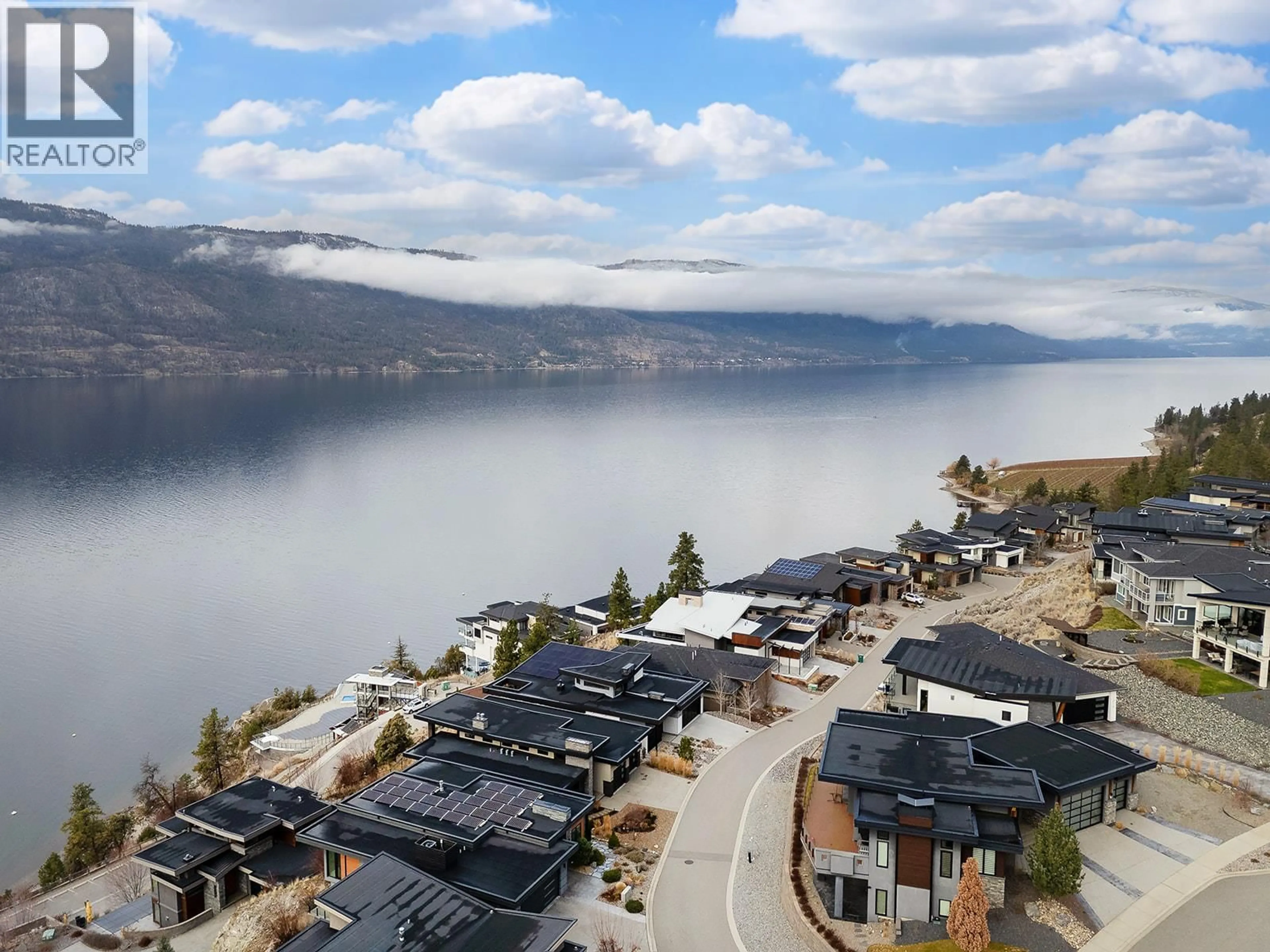 A pic from outside/outdoor area/front of a property/back of a property/a pic from drone, water/lake/river/ocean view for 1504 MARBLE LEDGE DRIVE, Lake Country British Columbia V4V2T4