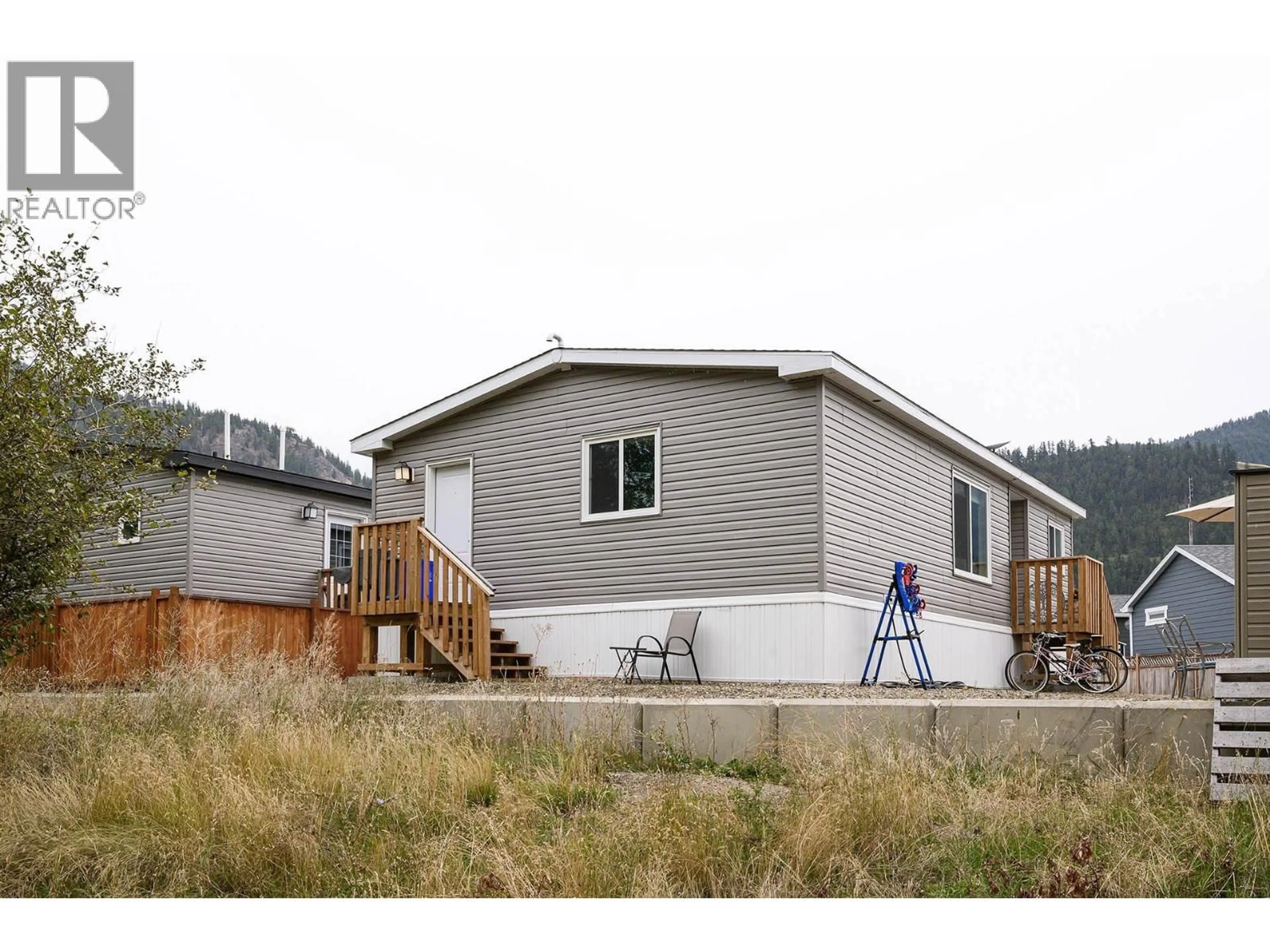 Home with vinyl exterior material, building for 3 - 235 AYLMER ROAD, Chase British Columbia V0E1M0