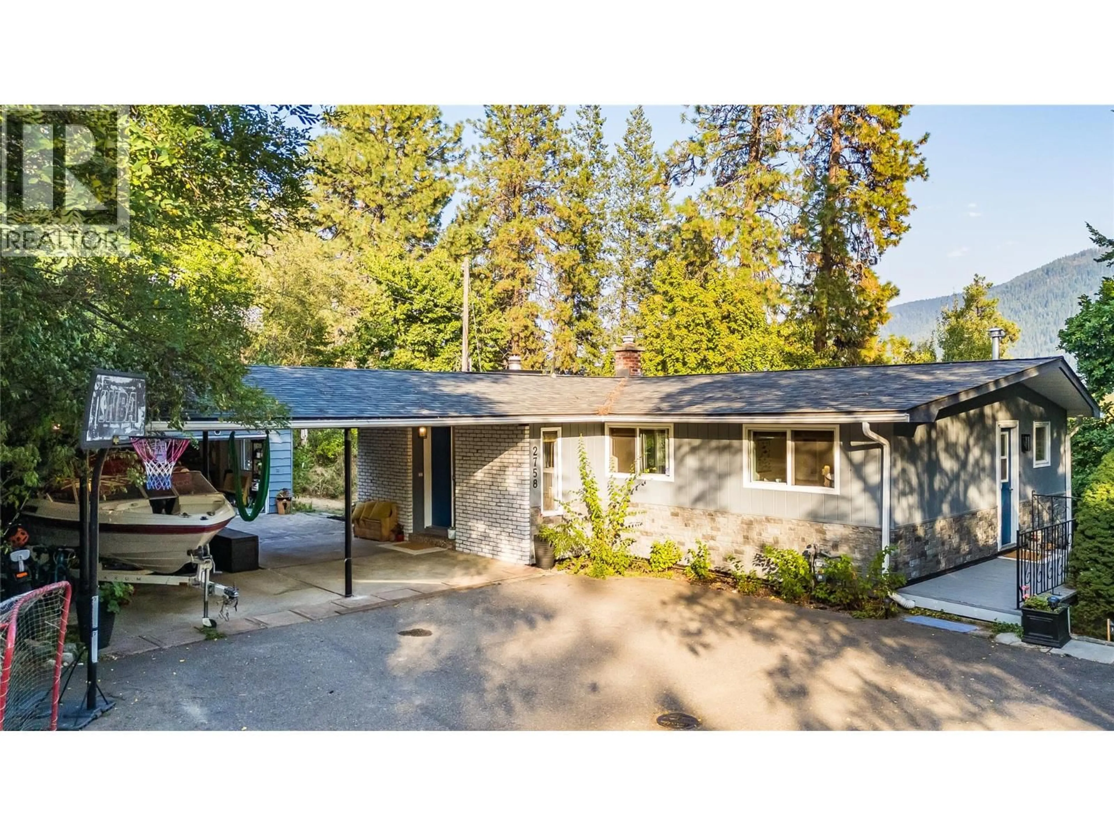 Home with vinyl exterior material, street for 2758 LEECREST ROAD, Nelson British Columbia V1L6L1