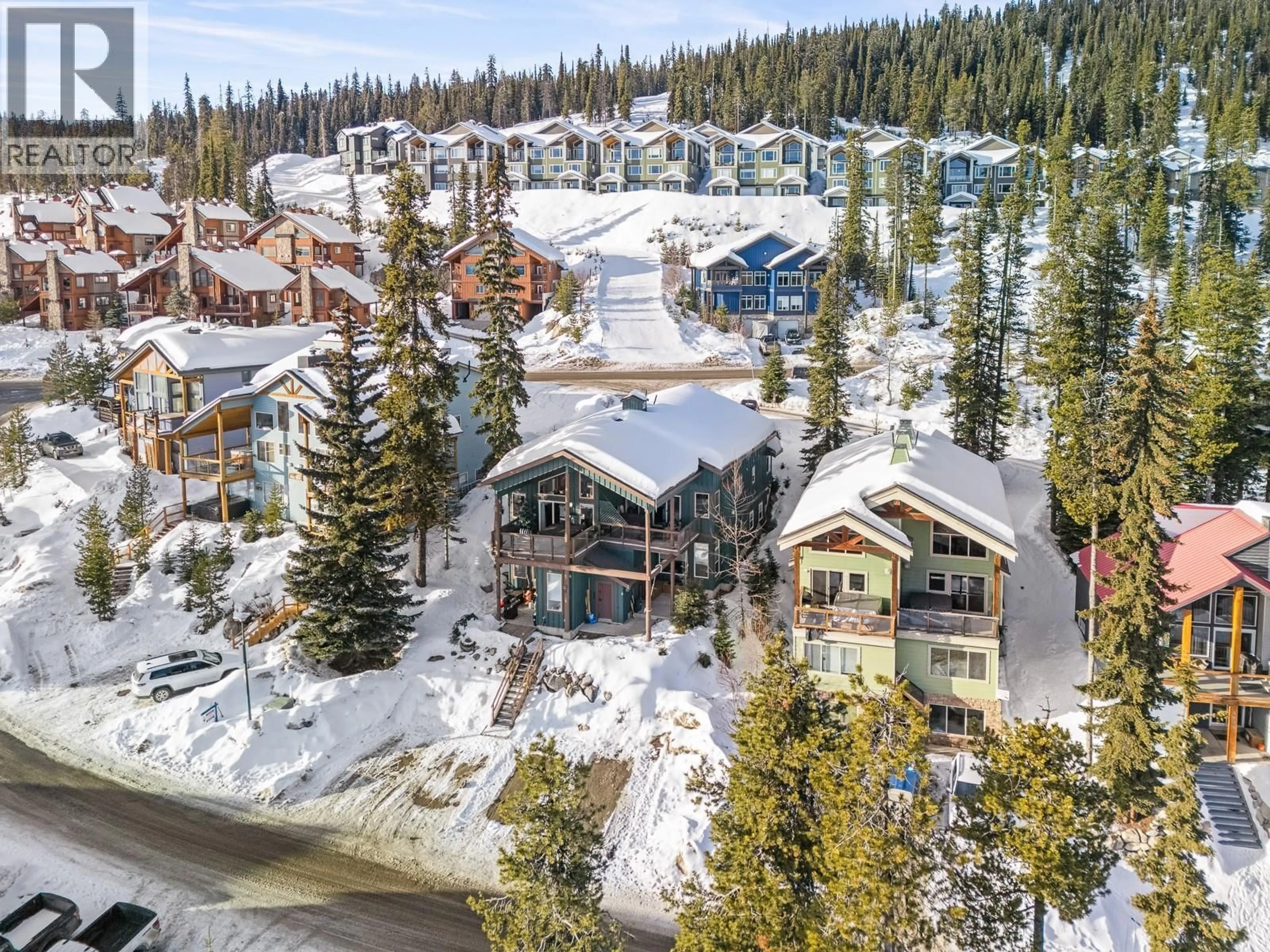 A pic from outside/outdoor area/front of a property/back of a property/a pic from drone, mountain view for A - 5825 SNOW PINES WAY, Big White British Columbia V1P1T4