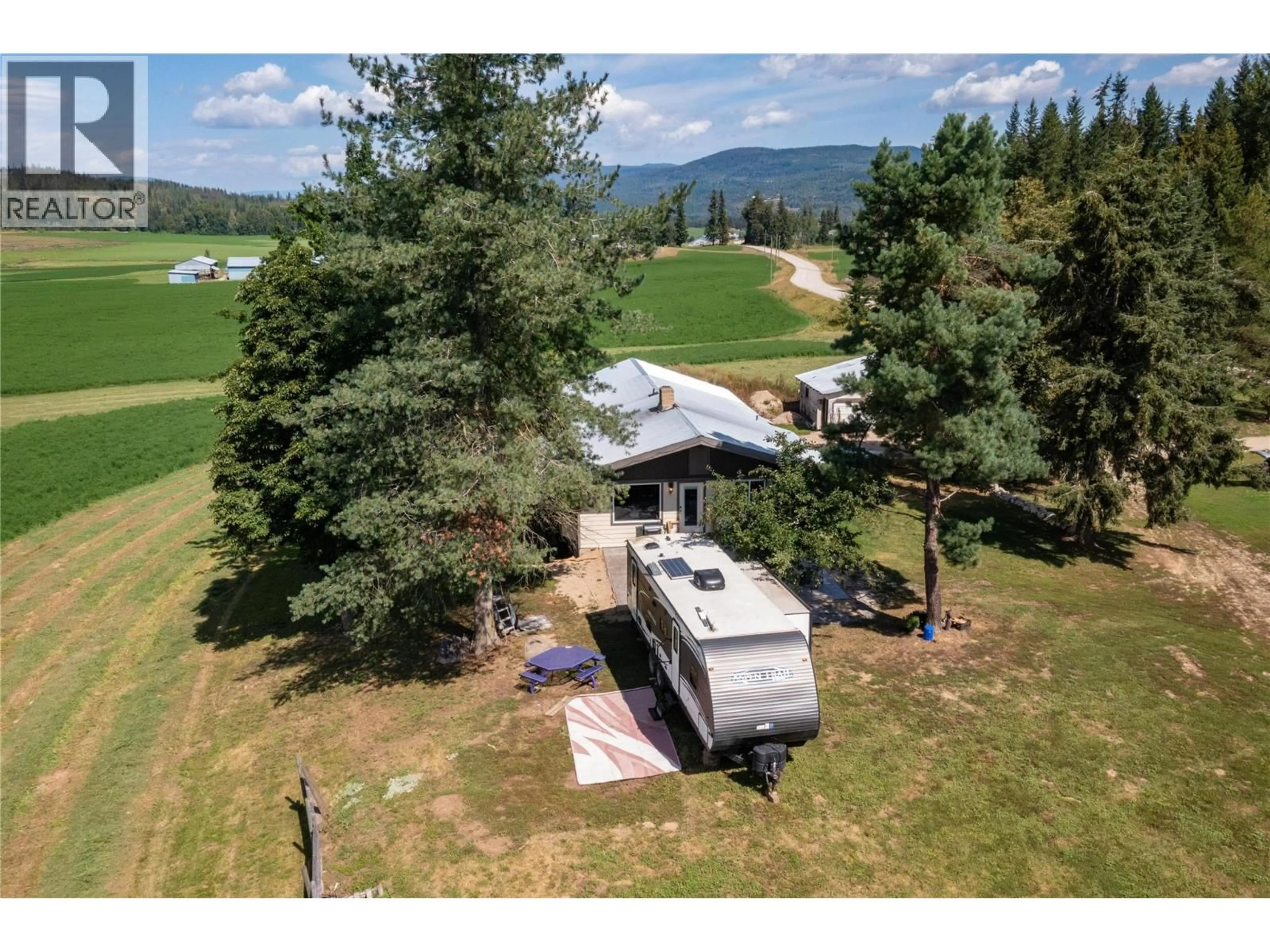 A pic from outside/outdoor area/front of a property/back of a property/a pic from drone, mountain view for 414 MALLORY ROAD, Enderby British Columbia V4Y4H9