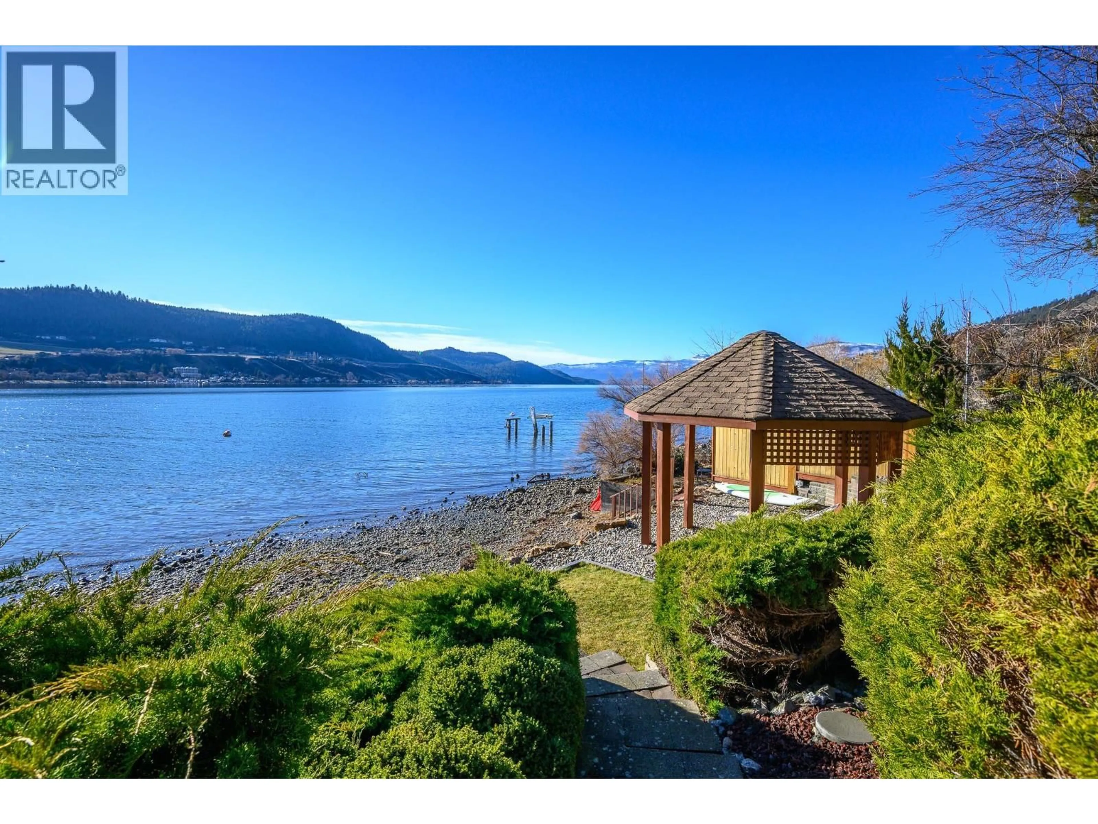 A pic from outside/outdoor area/front of a property/back of a property/a pic from drone, water/lake/river/ocean view for 7504 KENNEDY LANE, Vernon British Columbia V1H1C4