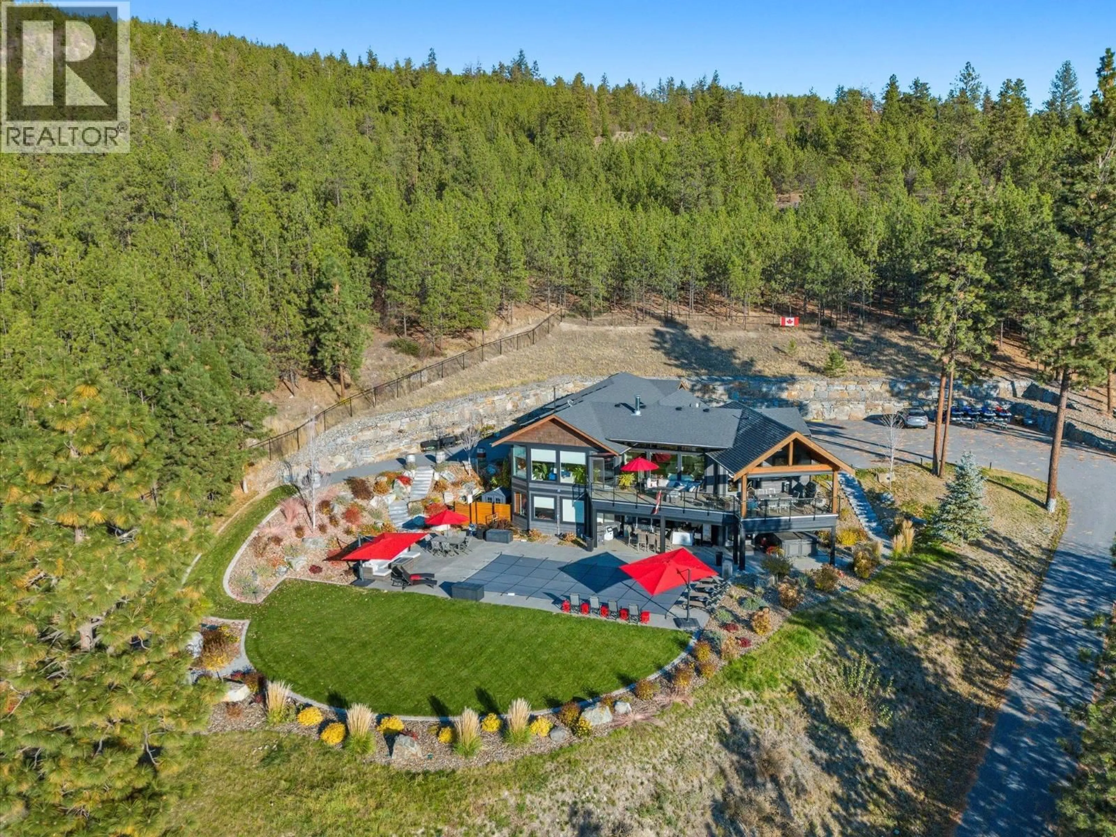 A pic from outside/outdoor area/front of a property/back of a property/a pic from drone, unknown for 14405 MOBERLY ROAD, Lake Country British Columbia V4V1A6