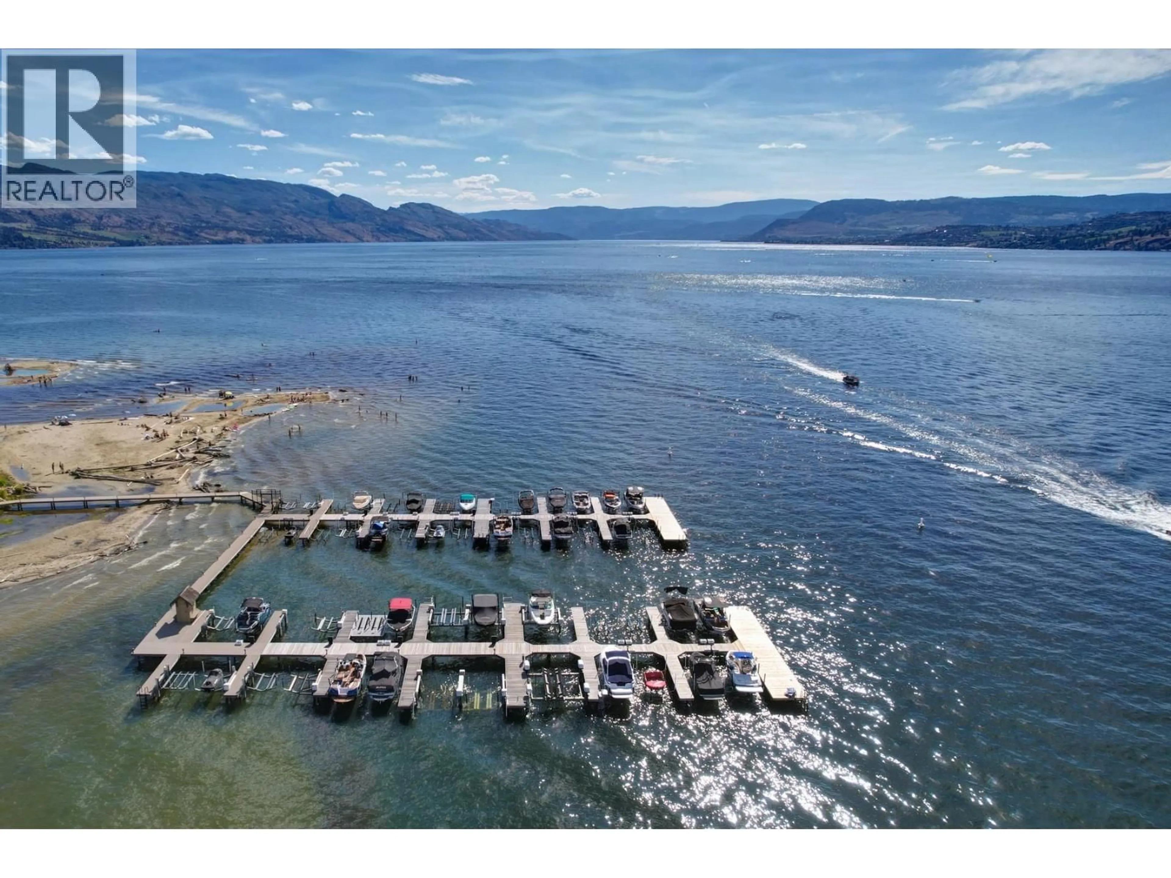 A pic from outside/outdoor area/front of a property/back of a property/a pic from drone, water/lake/river/ocean view for 523 - 3880 TRUSWELL ROAD, Kelowna British Columbia V1W5A2