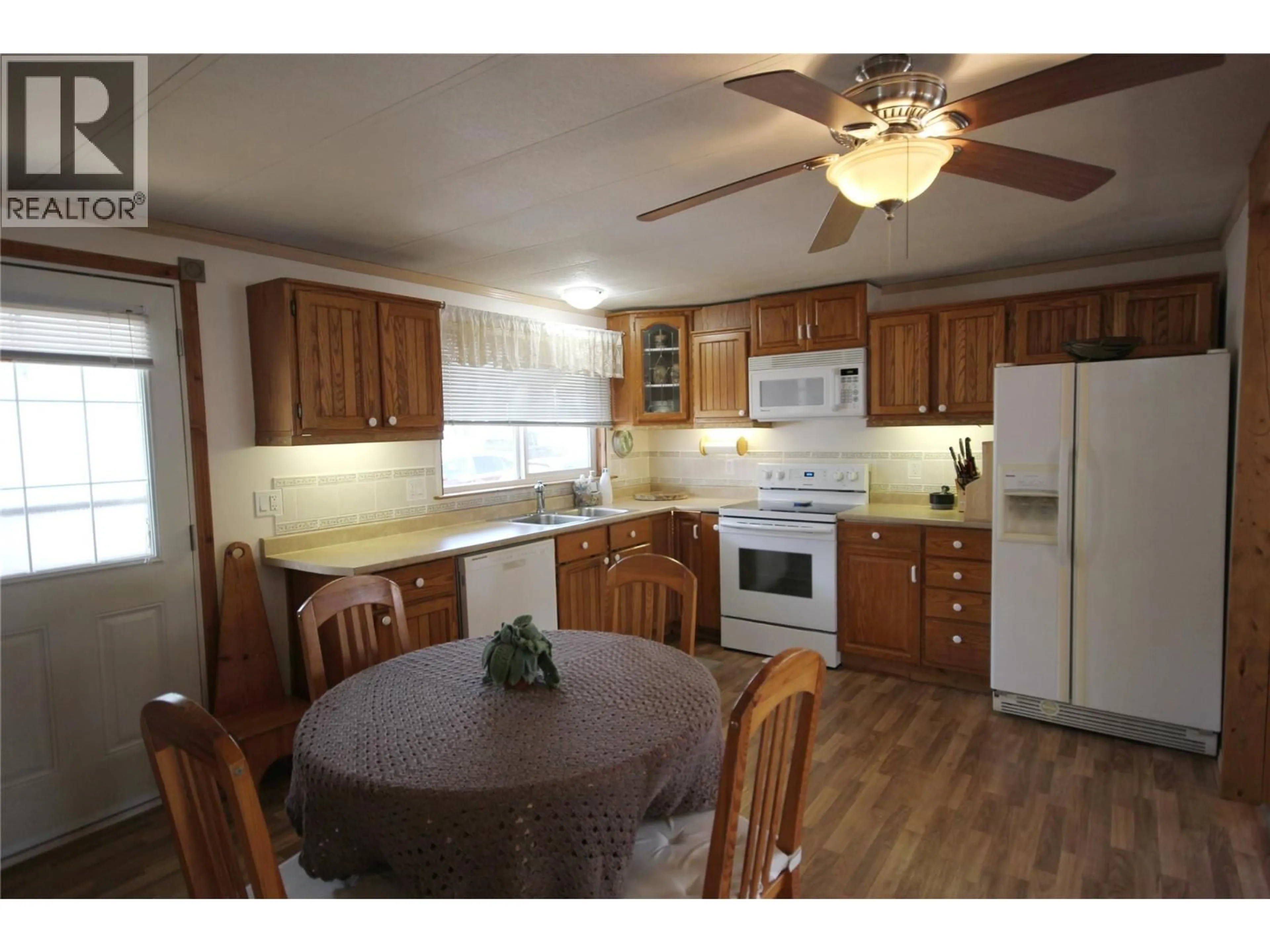 Standard kitchen, wood/laminate floor for 73 - 3999 SKAHA LAKE ROAD, Penticton British Columbia V2A6J7