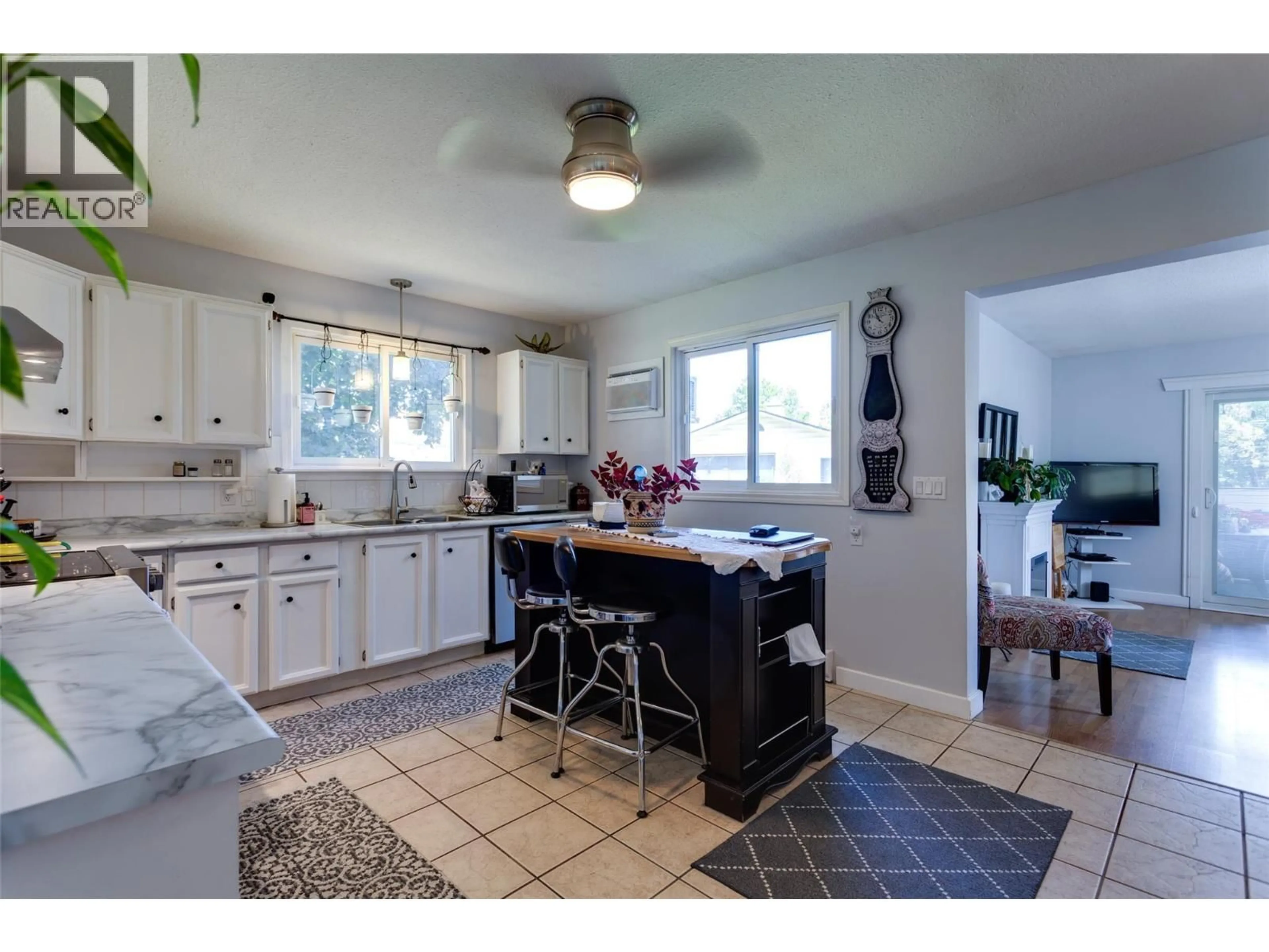 Open concept kitchen, ceramic/tile floor for 1490 CORNWALL ROAD, Kelowna British Columbia V1X1N9