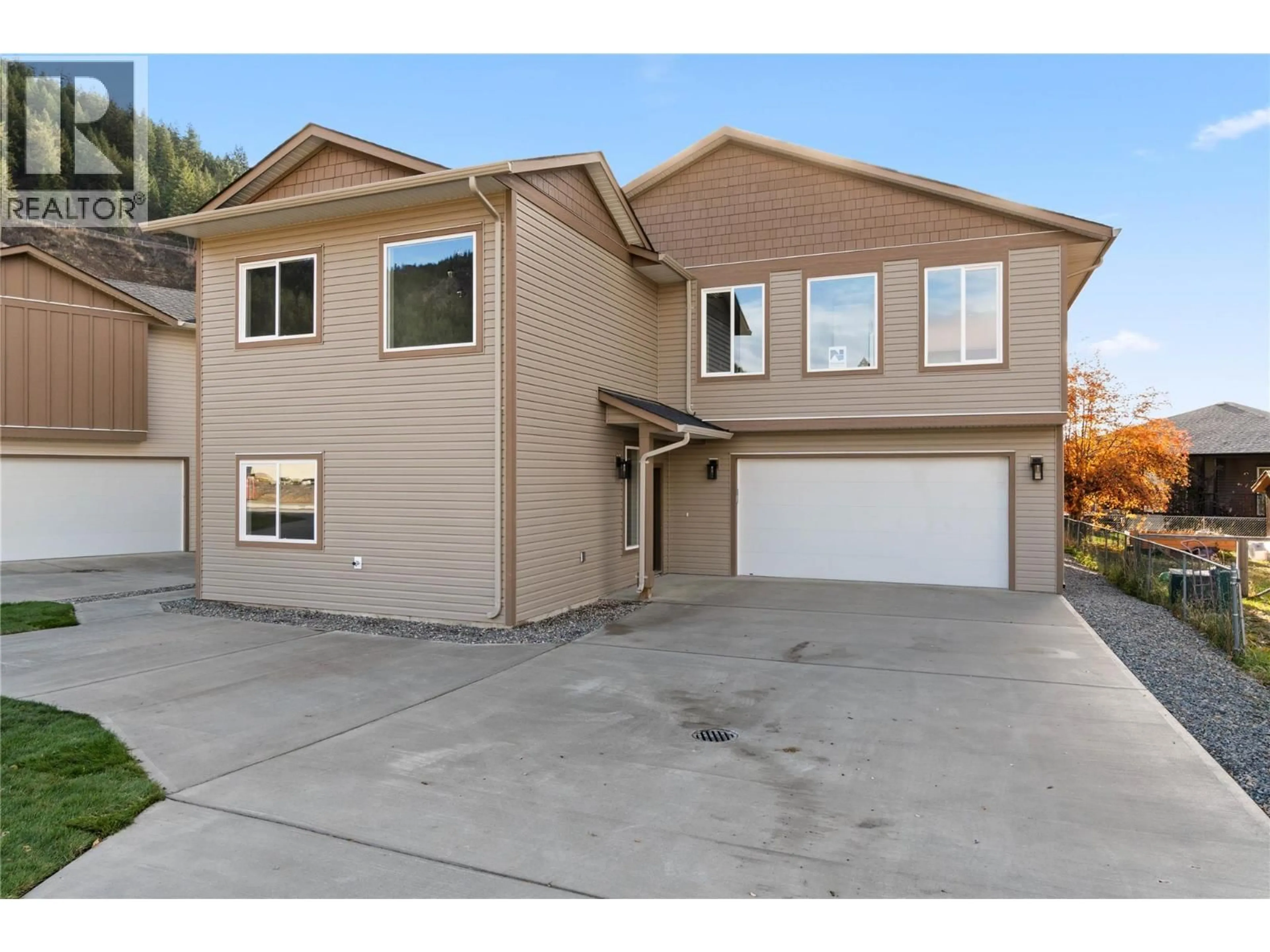 Home with vinyl exterior material, street for 302 BROOKE DRIVE, Chase British Columbia