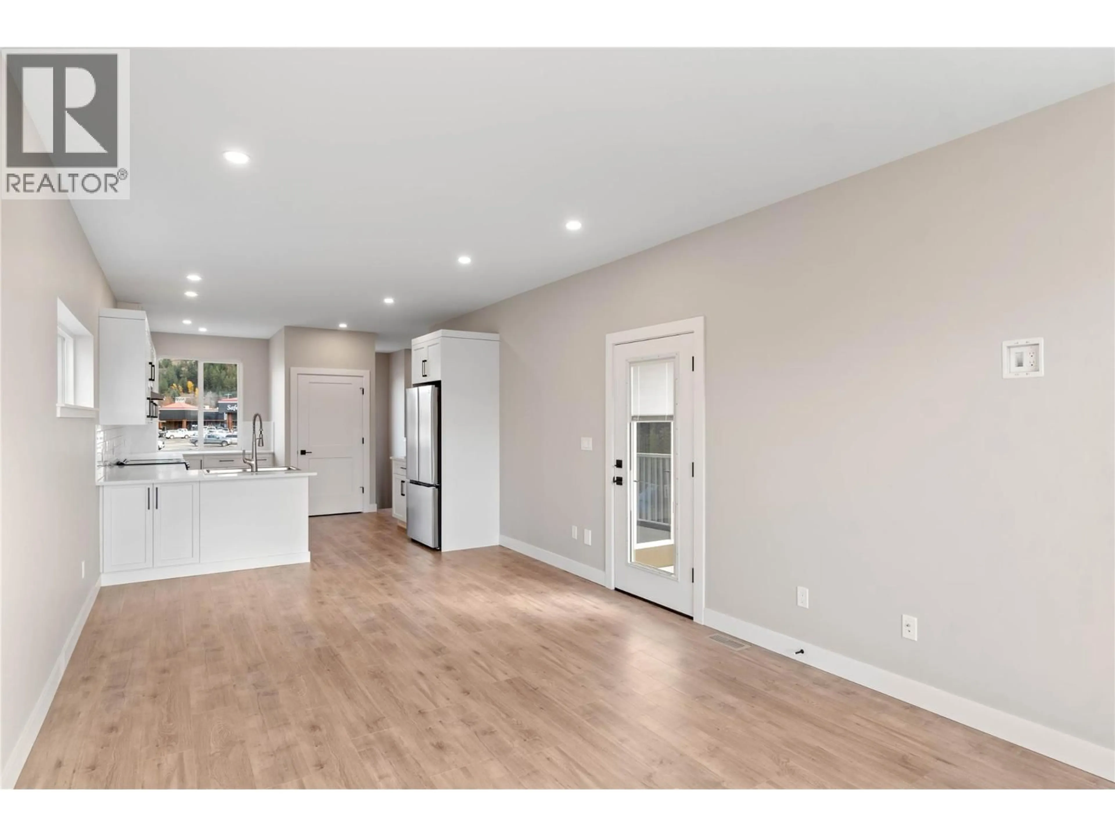 Open concept kitchen, wood/laminate floor for 300 BROOKE DRIVE, Chase British Columbia V0E1M0