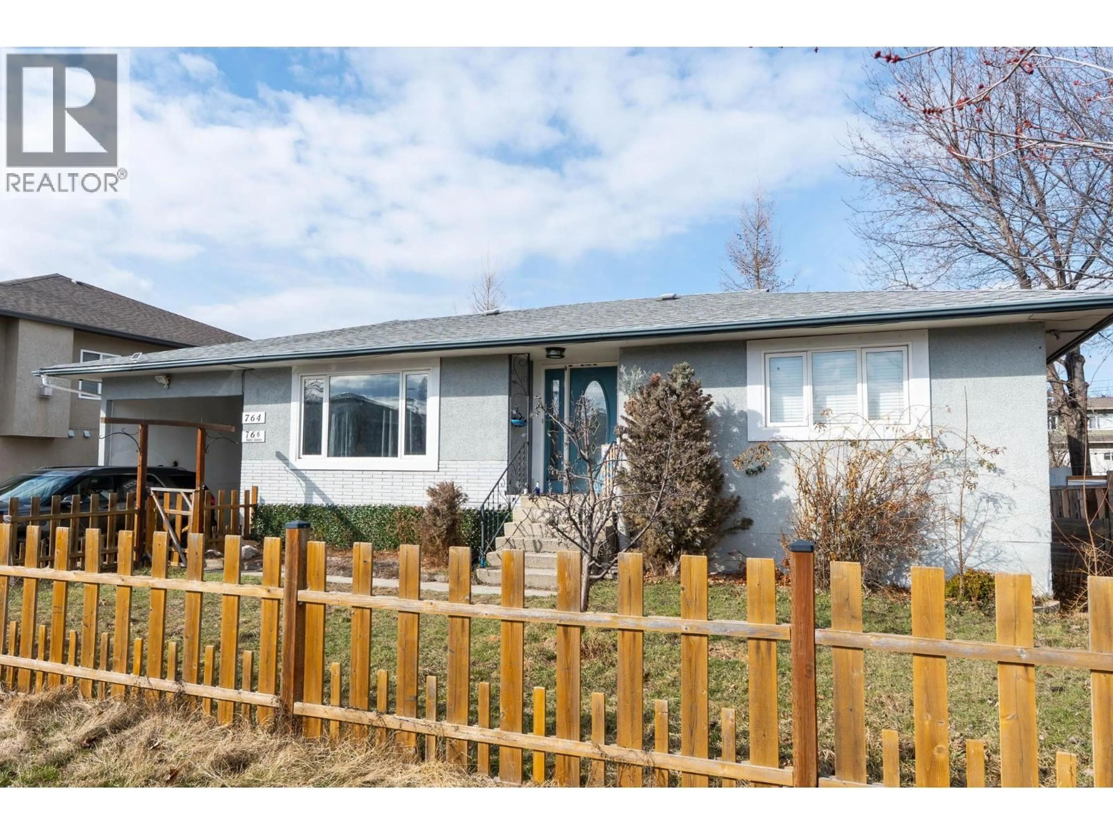 Home with vinyl exterior material, street for 764 FRANCIS AVENUE, Kelowna British Columbia V1Y5G5