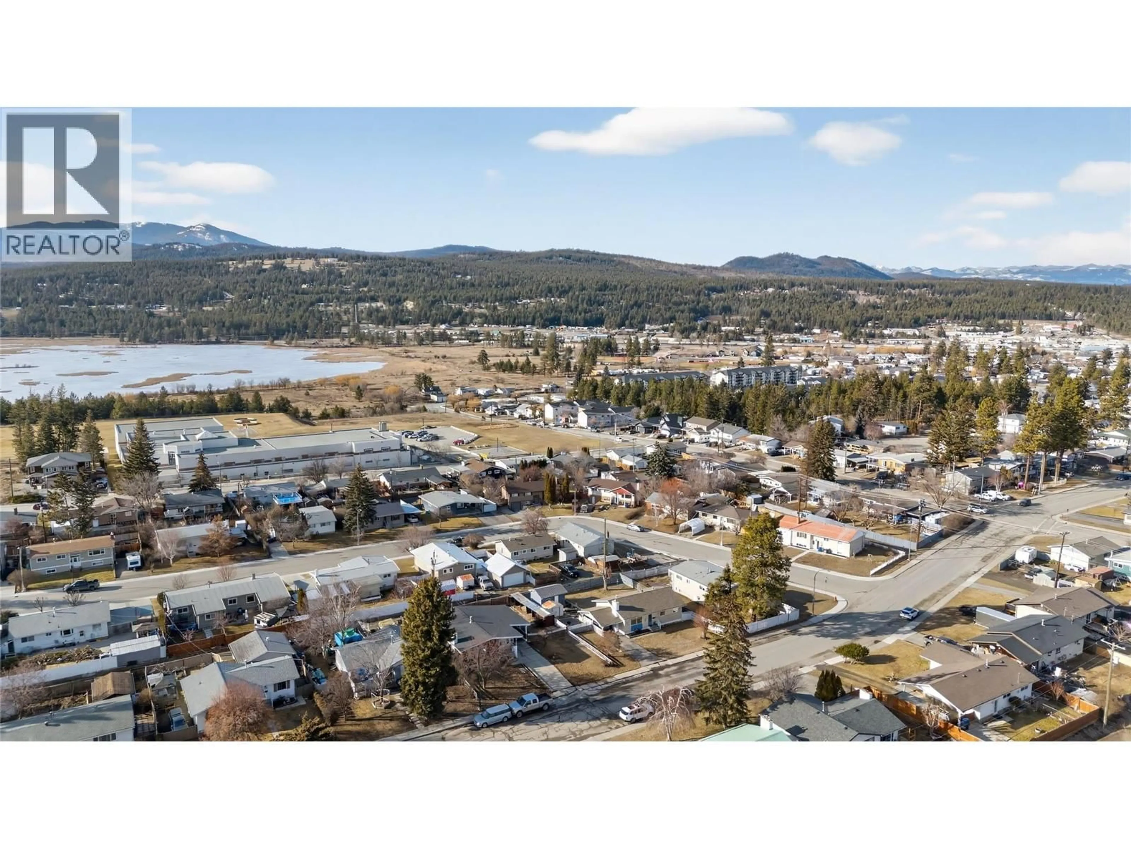 A pic from outside/outdoor area/front of a property/back of a property/a pic from drone, mountain view for 1209 3RD AVENUE SOUTH, Cranbrook British Columbia V1C2C7