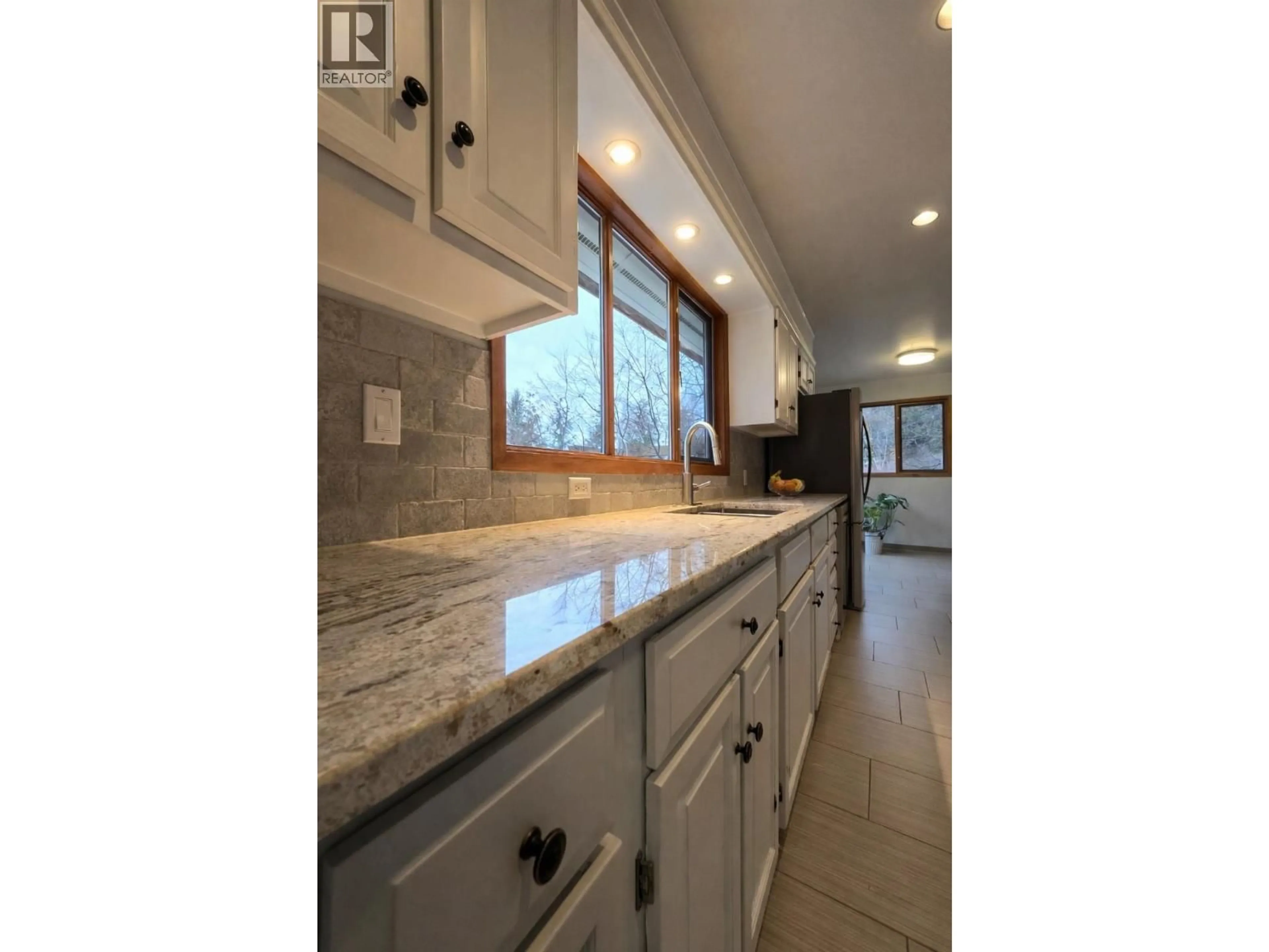 Open concept kitchen, ceramic/tile floor for 3946 MACGREGOR ROAD WEST, Nelson British Columbia V1L6M8