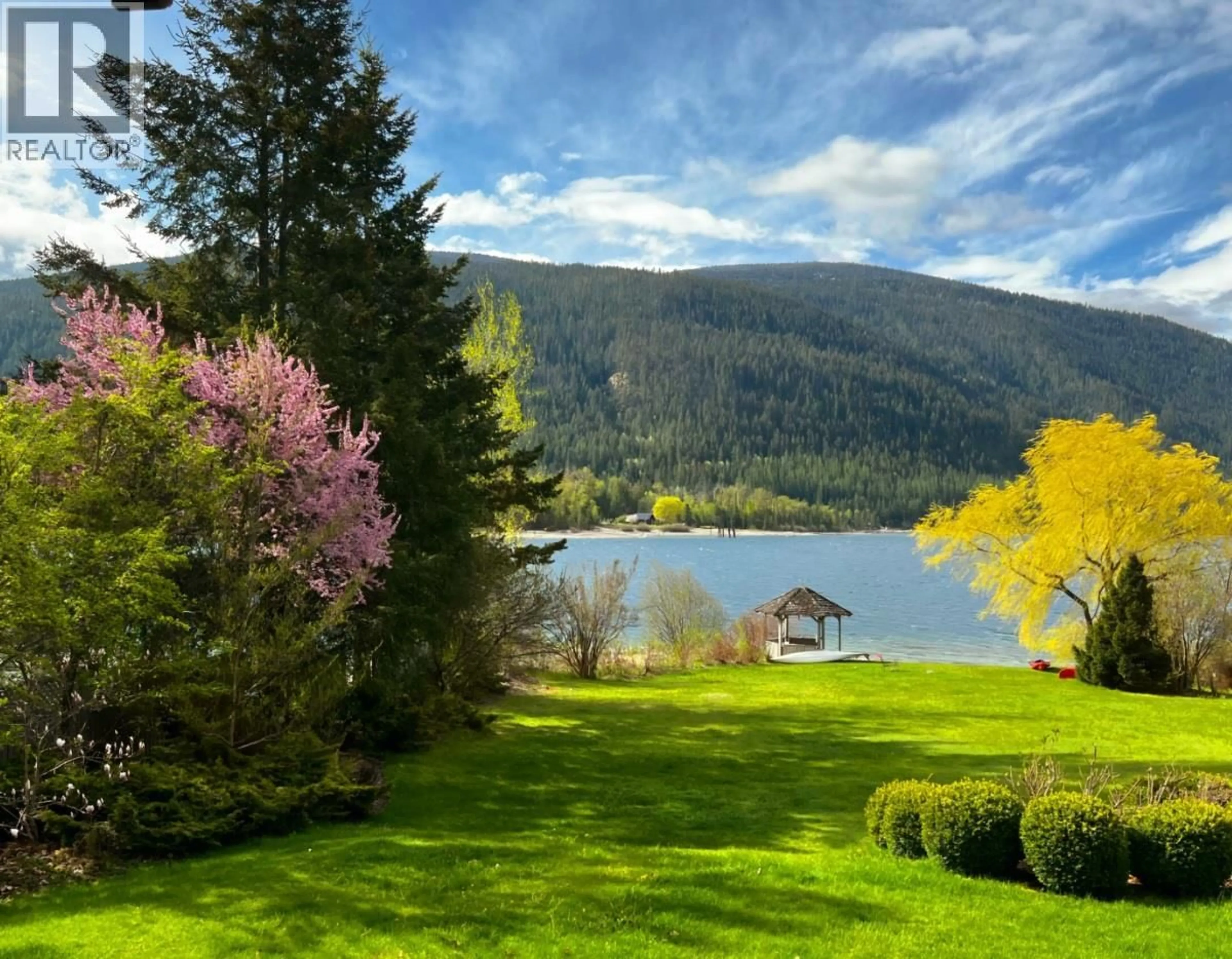 A pic from outside/outdoor area/front of a property/back of a property/a pic from drone, water/lake/river/ocean view for 3946 MACGREGOR ROAD WEST, Nelson British Columbia V1L6M8