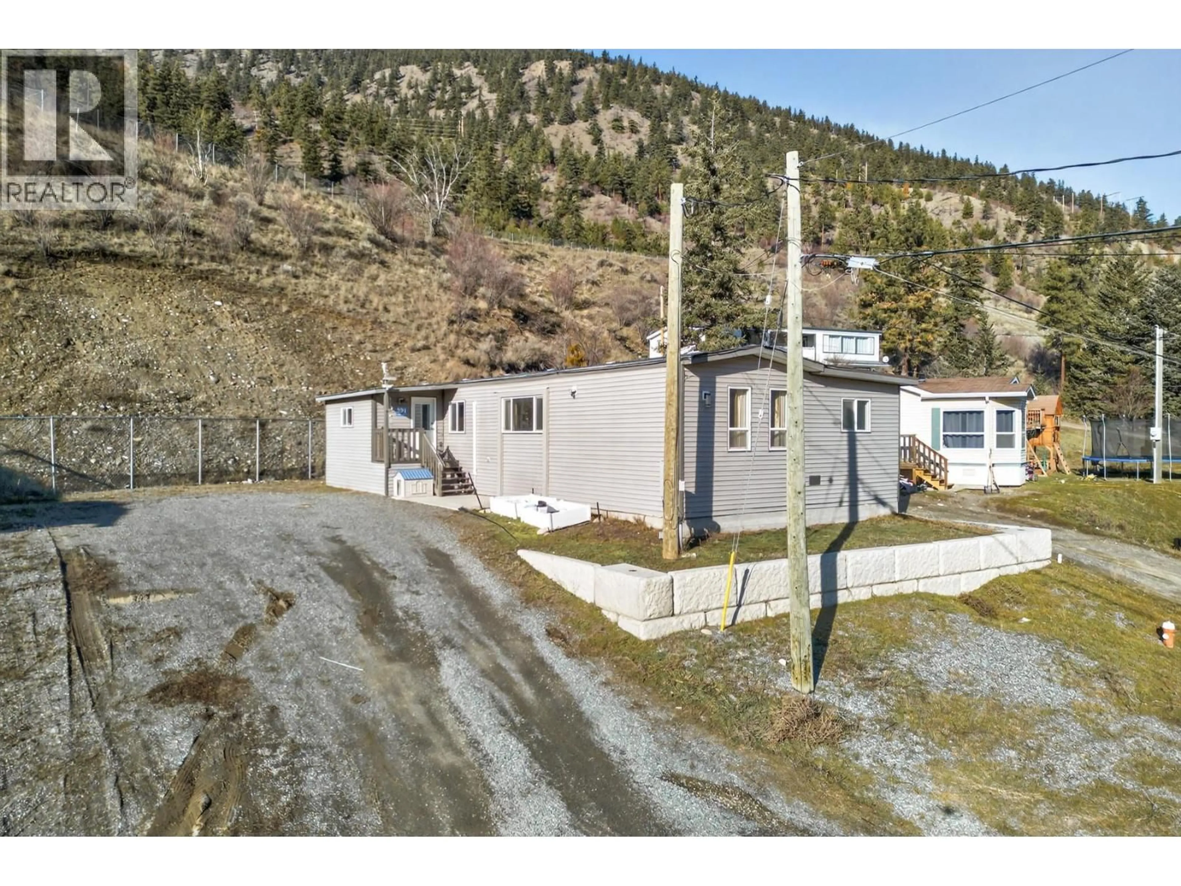 A pic from outside/outdoor area/front of a property/back of a property/a pic from drone, mountain view for 291 PARK DRIVE, Lillooet British Columbia V0K1V0
