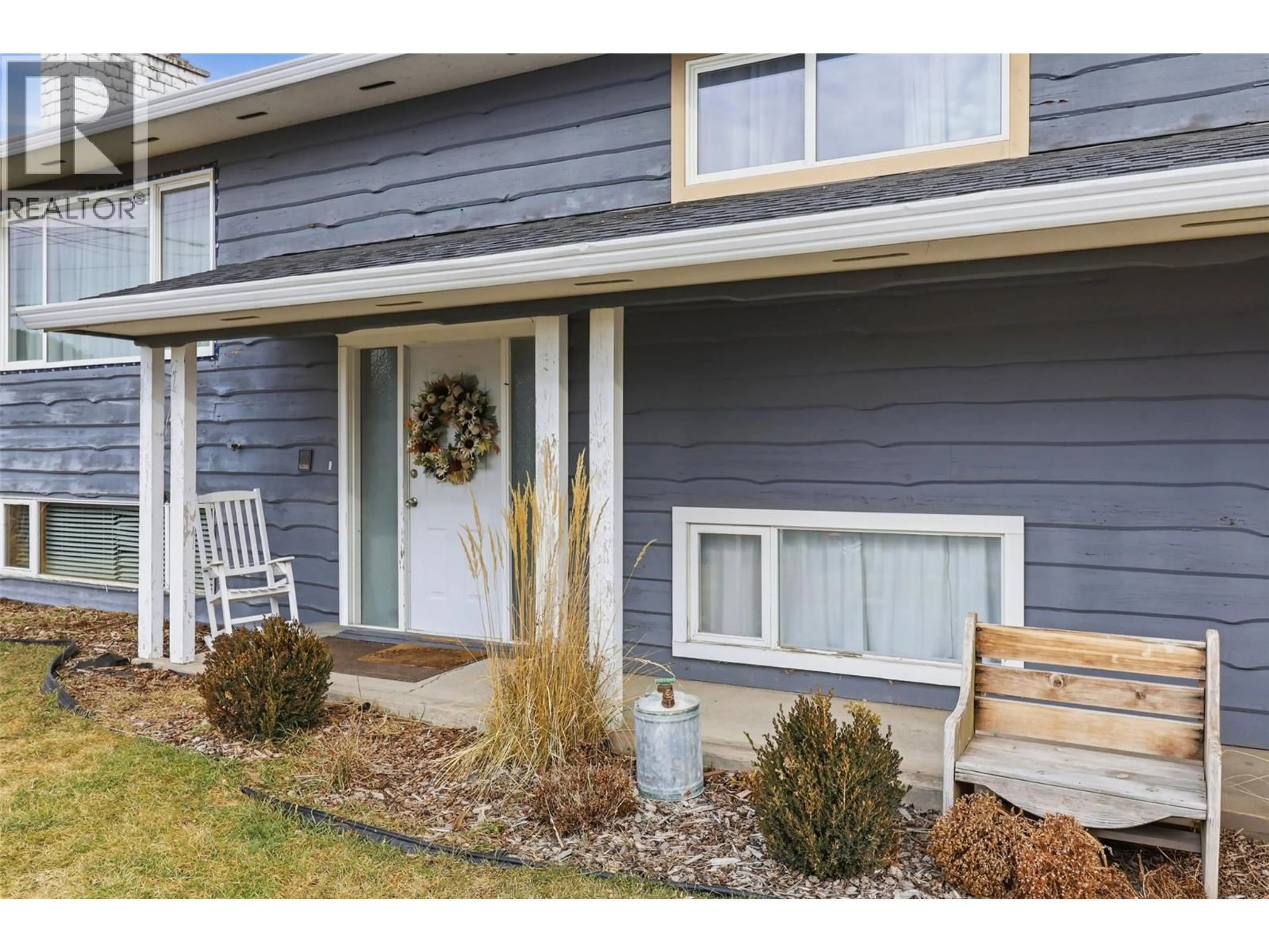 Home with vinyl exterior material, street for 2163 PARKER DRIVE, Merritt British Columbia V1K1J1