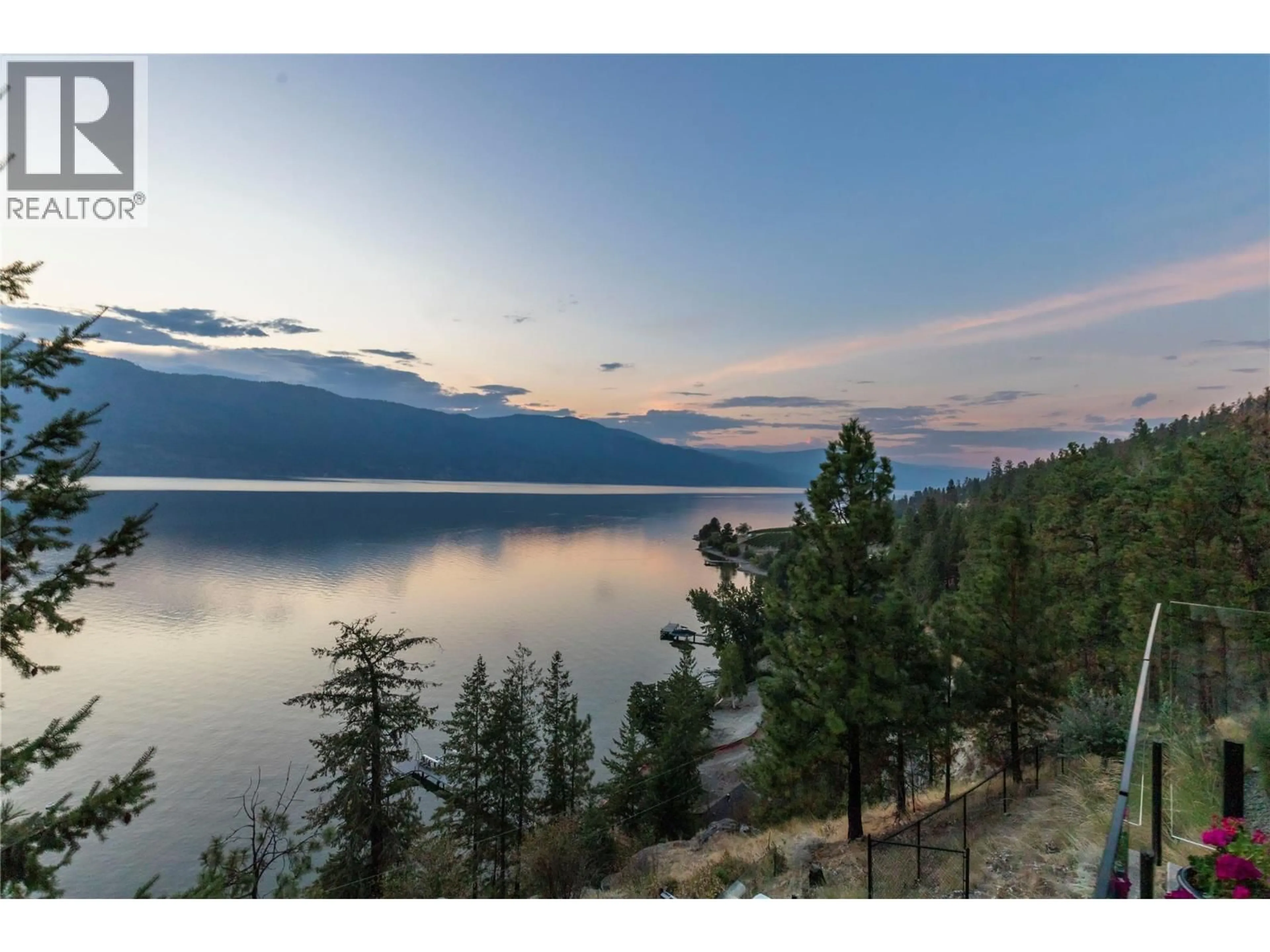 A pic from outside/outdoor area/front of a property/back of a property/a pic from drone, water/lake/river/ocean view for 1526 MARBLE LEDGE DRIVE, Lake Country British Columbia V4V2T4