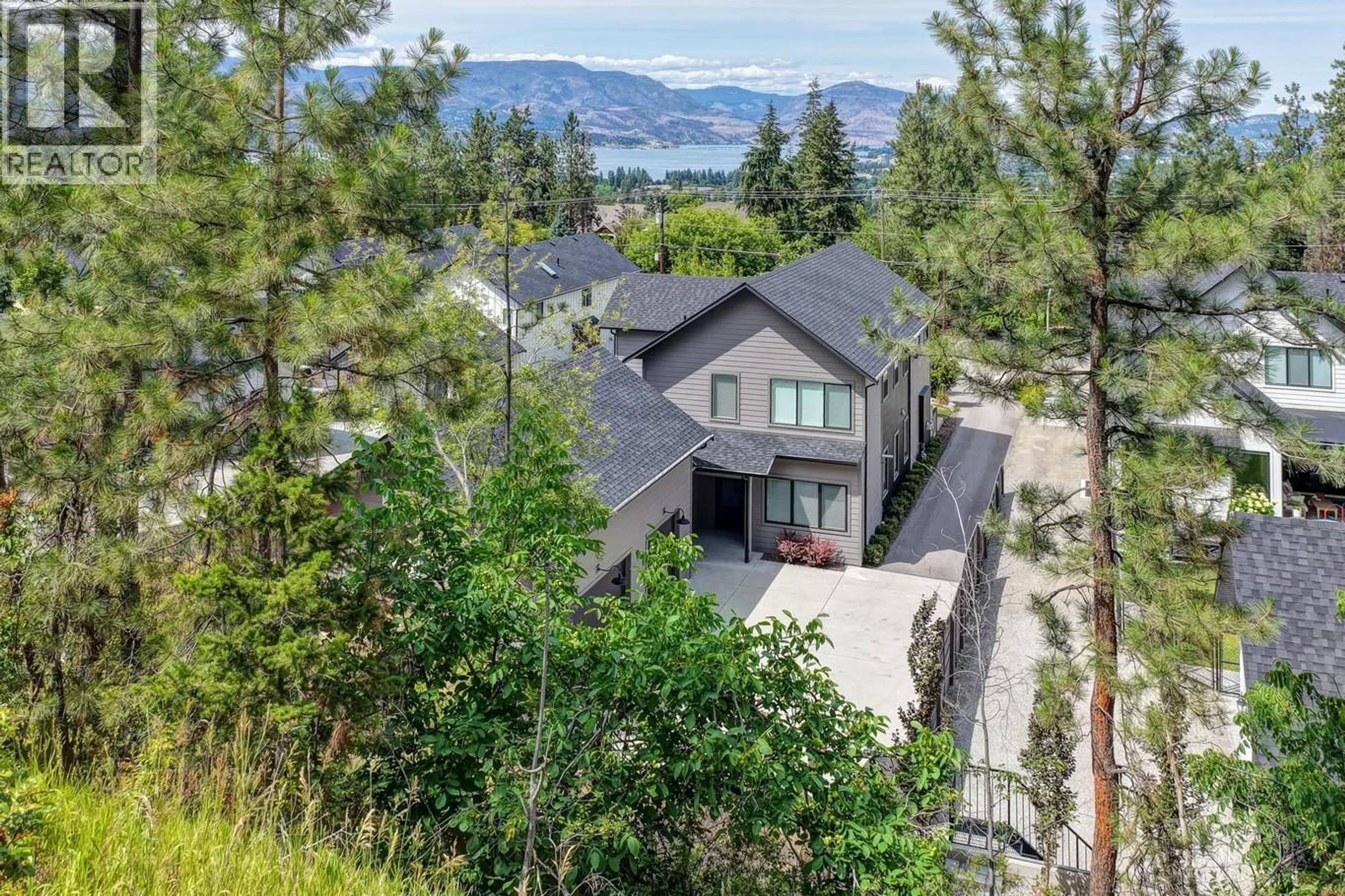 A pic from outside/outdoor area/front of a property/back of a property/a pic from drone, mountain view for 773 BARNABY ROAD, Kelowna British Columbia V1W4N9