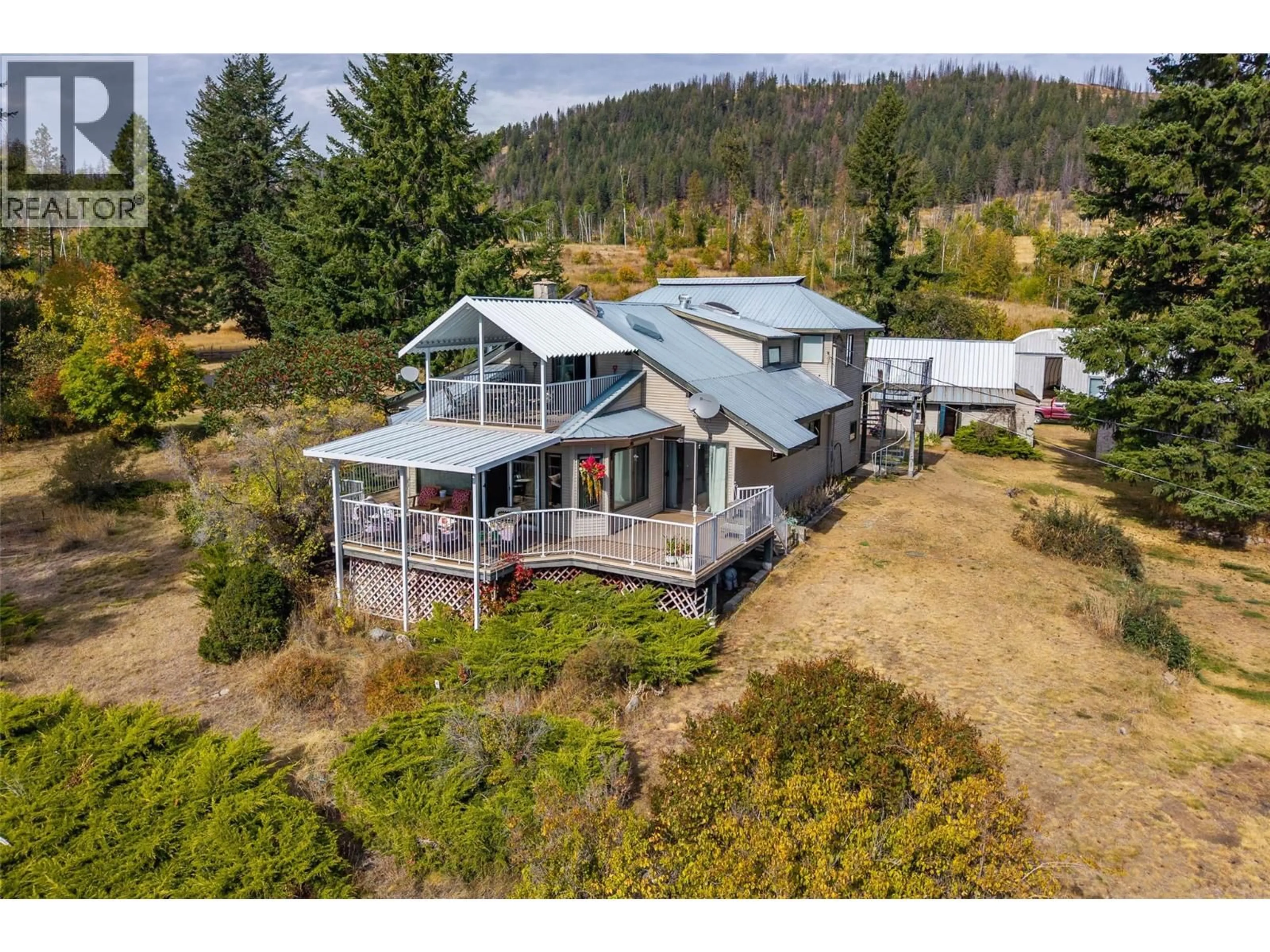 A pic from outside/outdoor area/front of a property/back of a property/a pic from drone, mountain view for 1722 LEE CREEK DRIVE, Lee Creek British Columbia V0E1M4