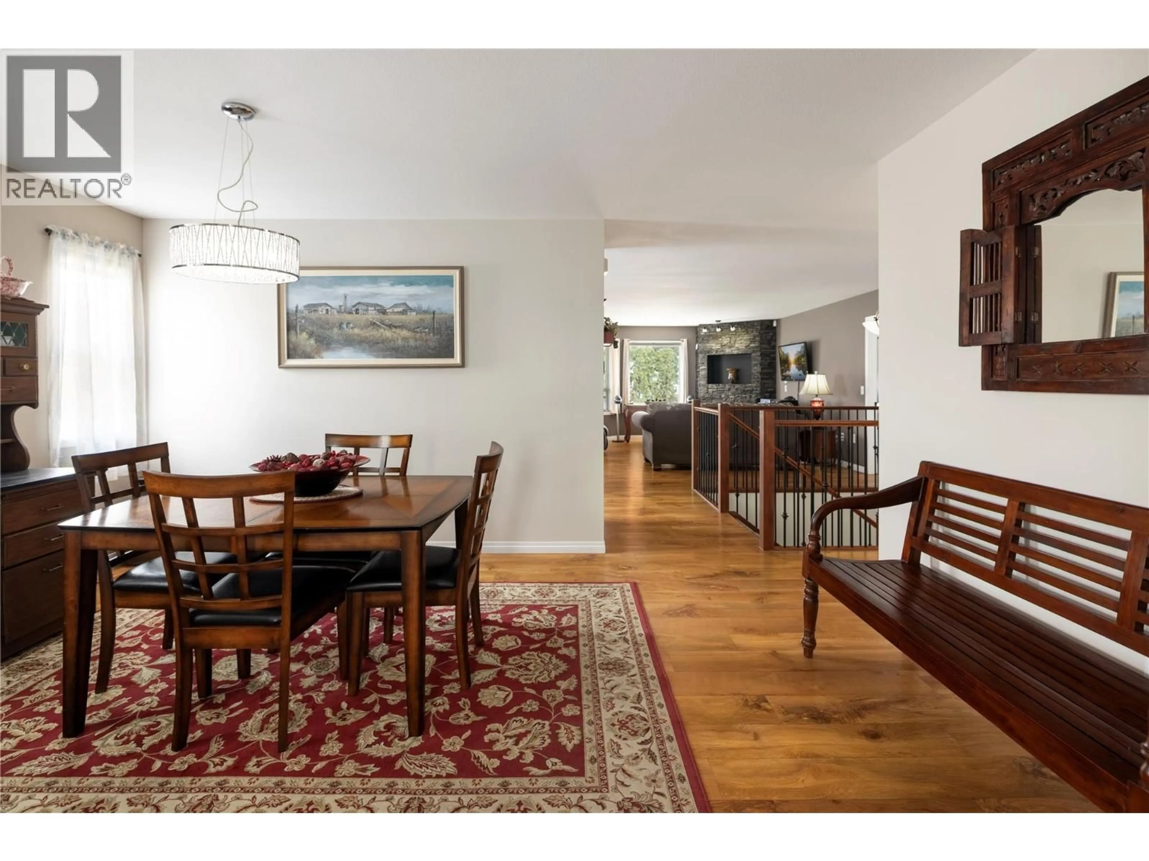 Dining room, wood/laminate floor for 5780 TERN PLACE, Vernon British Columbia V1H1R2