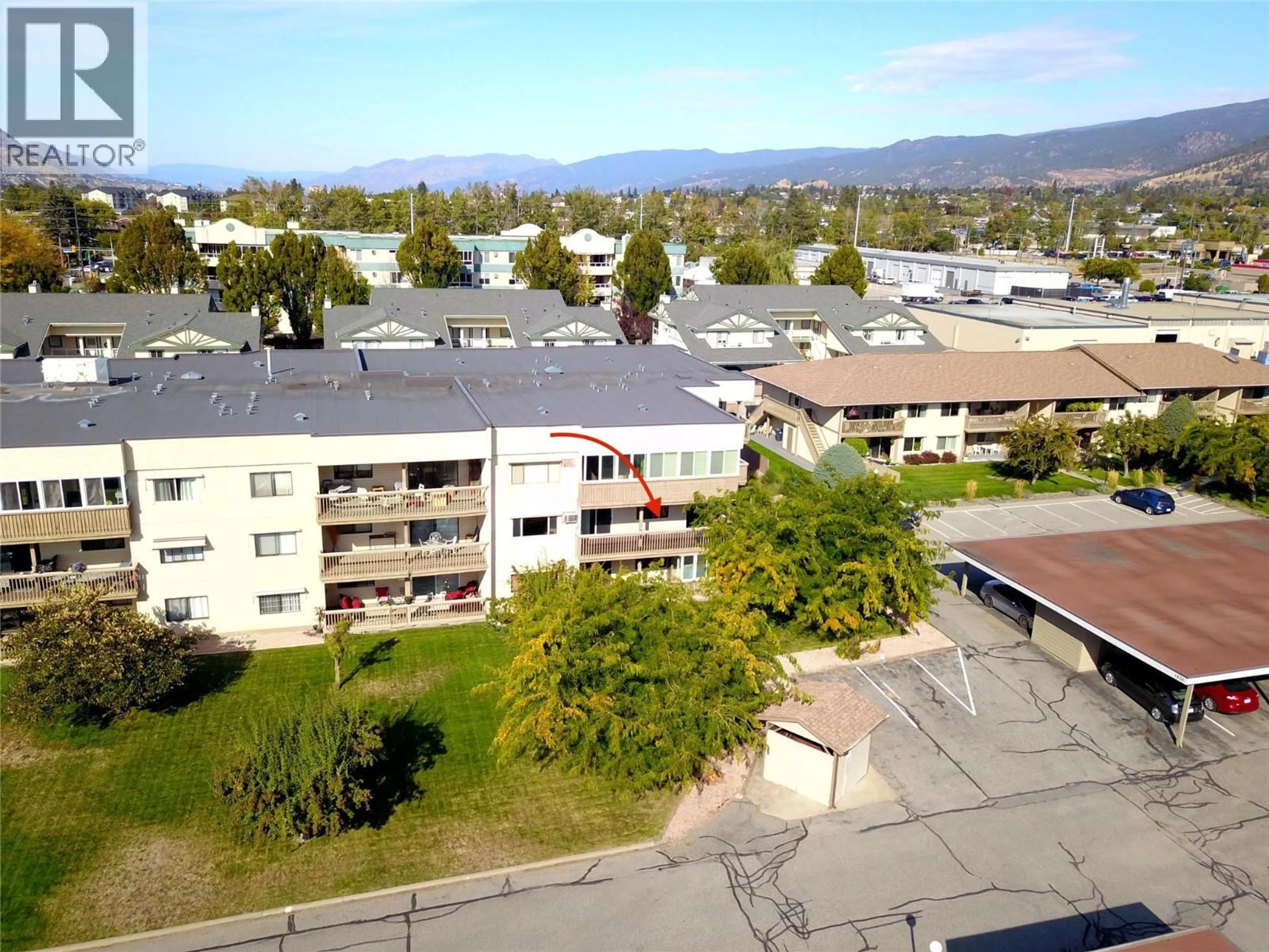 A pic from outside/outdoor area/front of a property/back of a property/a pic from drone, mountain view for 207 - 1820 ATKINSON STREET, Penticton British Columbia V2A7M6