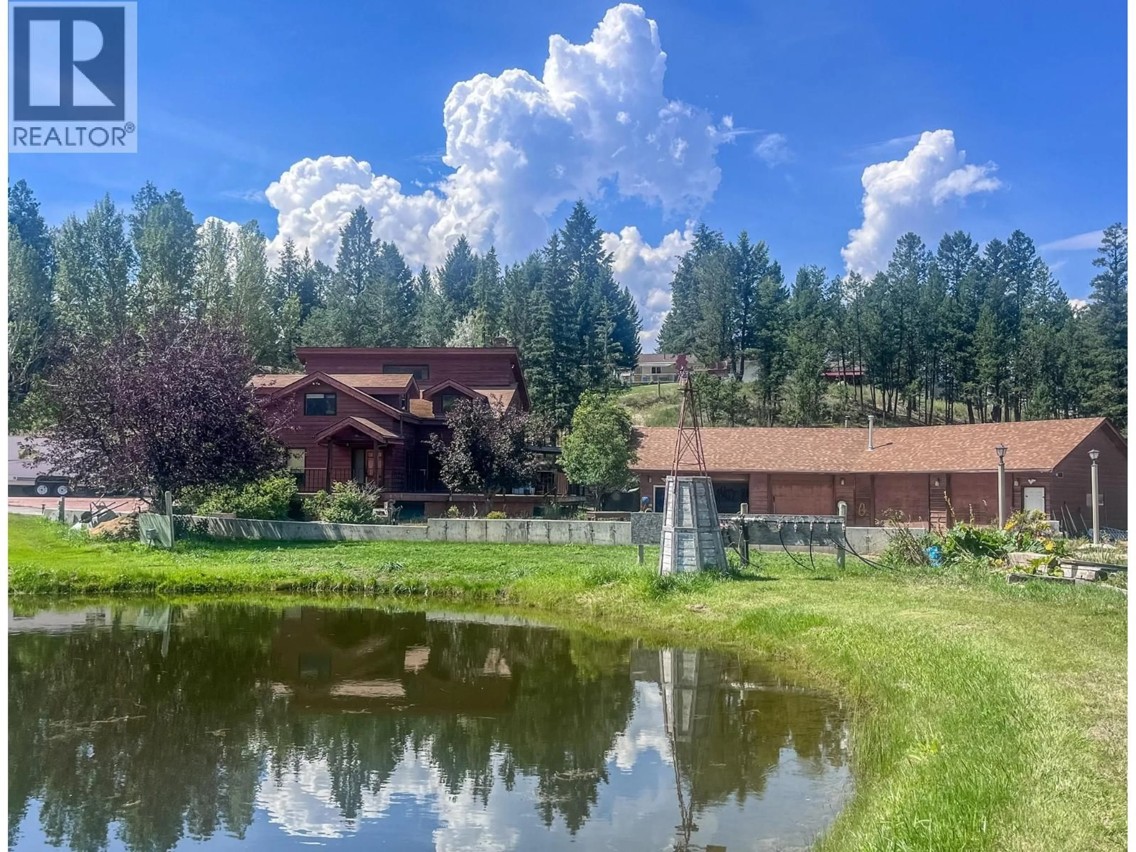A pic from outside/outdoor area/front of a property/back of a property/a pic from drone, water/lake/river/ocean view for 1049 SWANSEA ROAD, Invermere British Columbia V0A1K3
